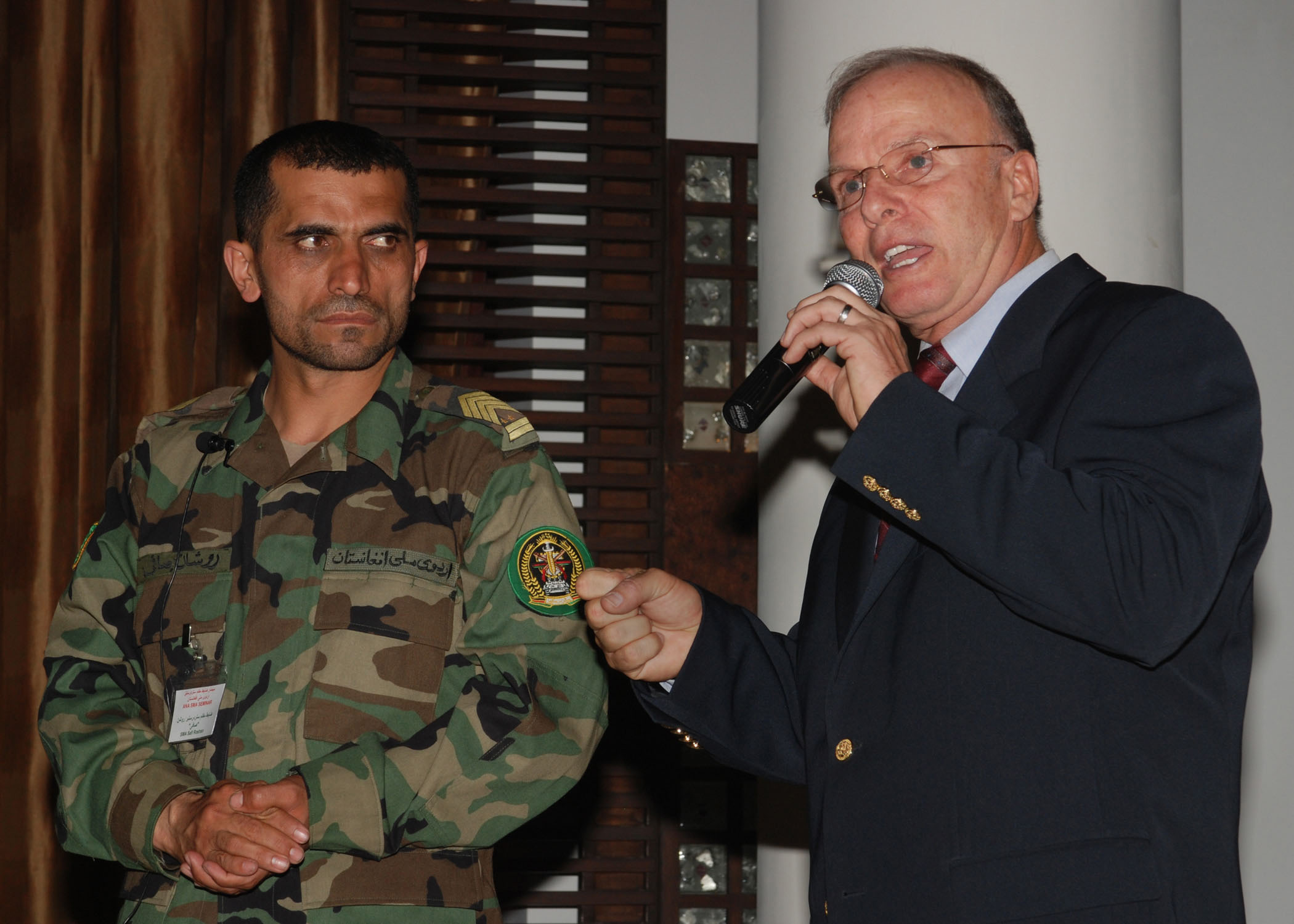 Sgt maj of the afghan national army safi roshan translates for