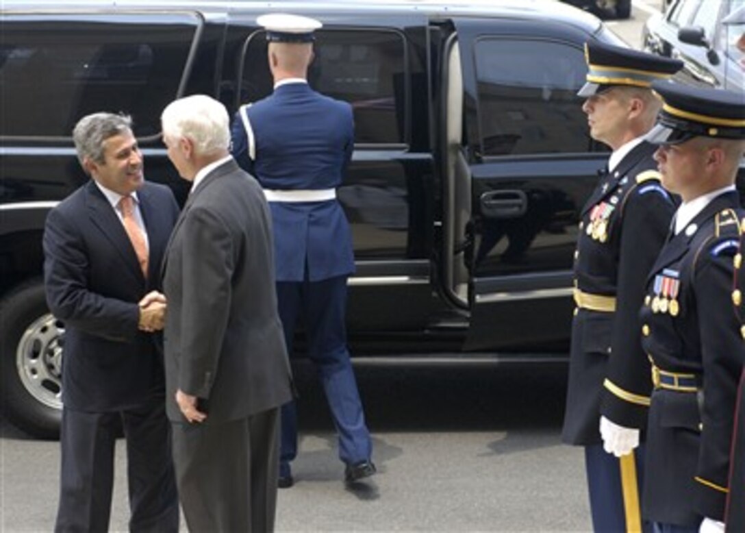 Portuguese Defense Minister Nuno Severiano Teixeira (left) is greeted by Secretary of Defense Robert M. Gates as he arrives at the Pentagon on June 8, 2007.  Teixeira and Gates will meet to discuss bilateral security issues.  