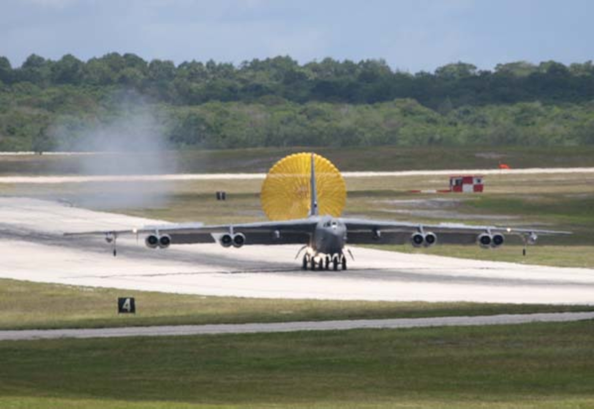 ANDERSEN AIR FORCE BASE, Guam - A B-52H deployts its drogue chute after landing at Andersen Air Force Base.  The aircraft is deployed from Barksdale AFB, La.  B-52s like the one seen in this picture has been in the Air Force inventory since 1960.  (Photo by Senior Master Sgt. Mahmoud Rasouliyan/ 36th Expeditionary Aircraft Maintenance Squadron)
