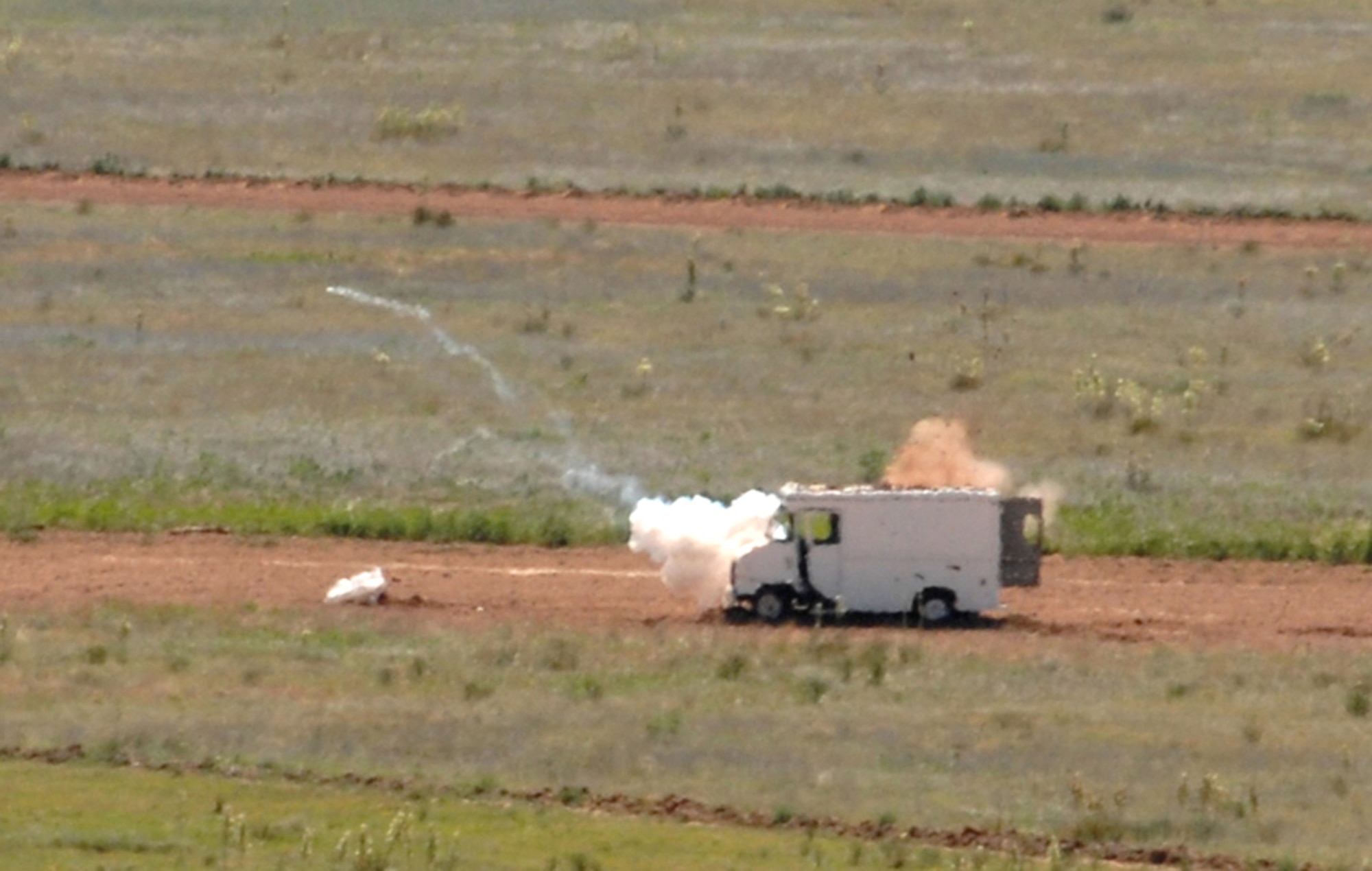 A box truck plays the role of an enemy vehicle target during the Pioneer Air Festival air combat competition held June 8 at Cannon Air Force Base. The competition brought nine Air Force wings together and measured the accuracy and timeliness of weapons loading and bombing. (U.S. Air Force photo/Airman 1st Class Randi Flaugh)