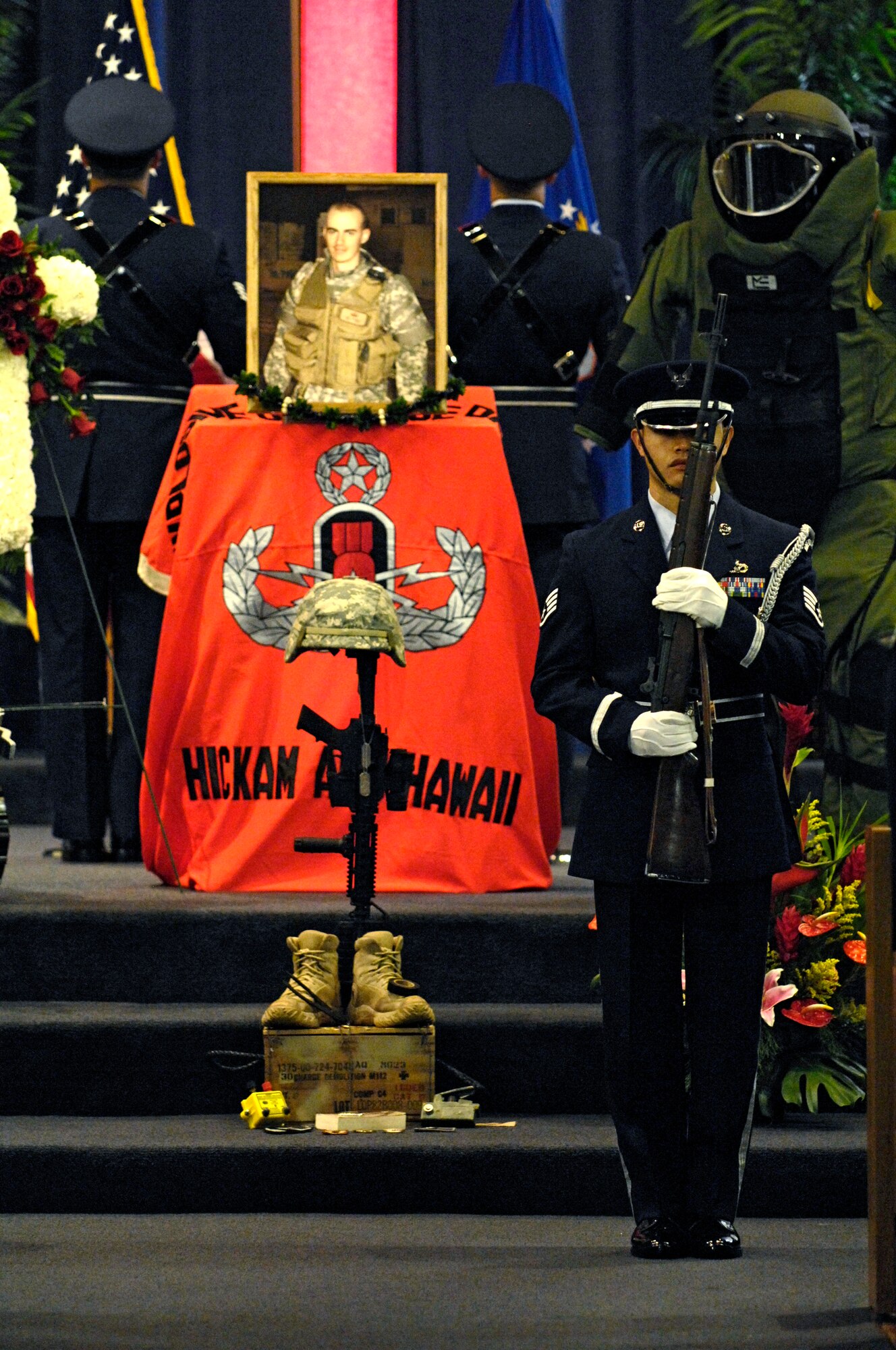 Members of the Honor Guard post the colors during a memorial service honoring Senior Airman William Newman at the Hickam Air Force Base chapel June 13, 2007. Airman Newman, an explosive ordnance disposal technician assigned to the 15th Civil Engineer Squadron, was killed June 7 by an improvised explosive device, which detonated while he was supporting Army and Iraqi security forces near the village of Mishna, Iraq. (U.S. Air Force photo by Tech. Sgt. Shane A. Cuomo)

