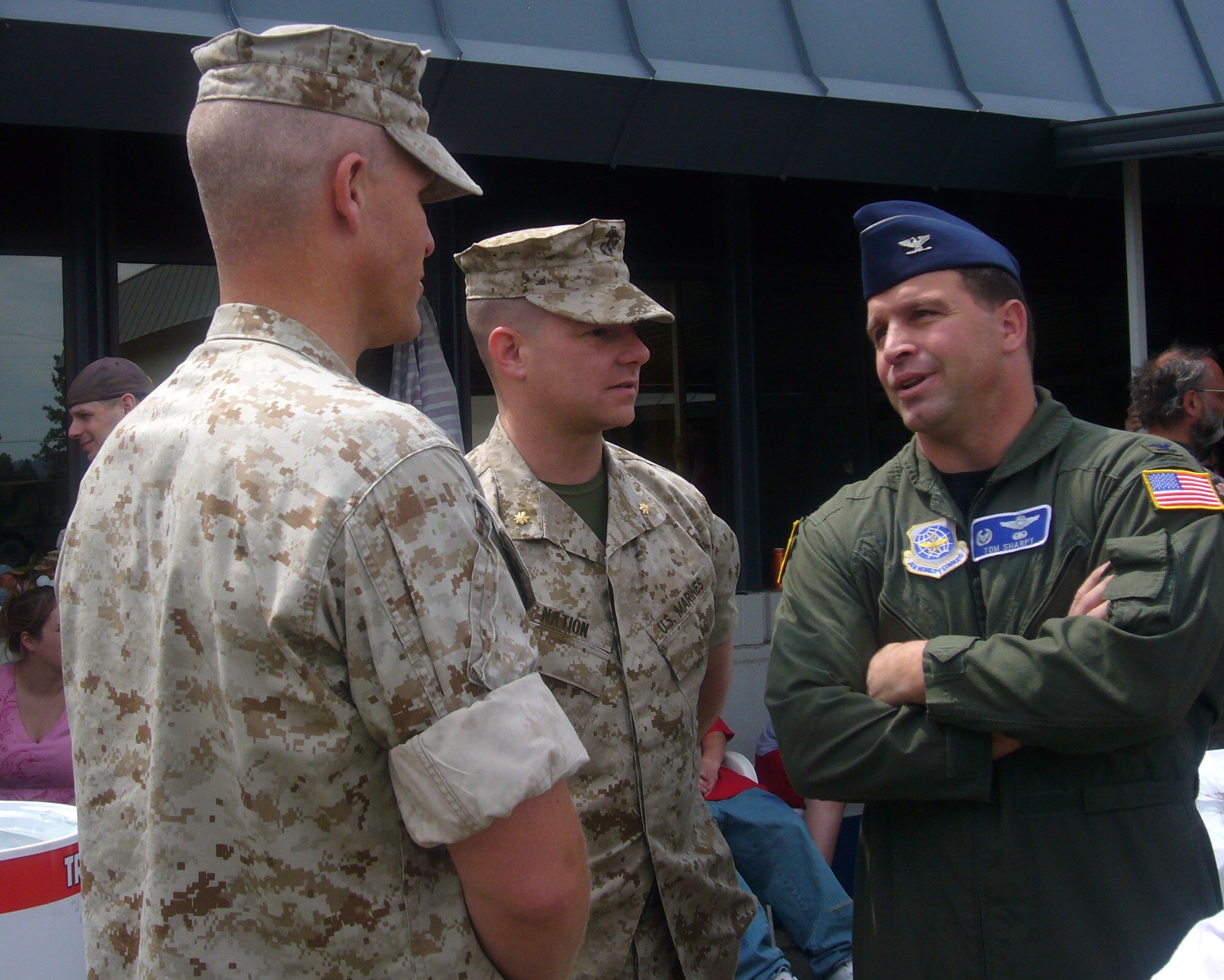 FAIRCHILD AIR FORCE BASE, Wash. -- Col. Thomas Sharpy, 92nd Air Refueling Wing commander, talks to Marines June 9 during an event held for more than 150 local deploying Marines and their families held at the U.S. Naval & Marine Corps Reserve Center. The colonel took command here in May and says that leading the wing is "probably the highlight of my career." Colonel Sharpy served in Desert Shield and Desert Storm, and has flown the KC-135, C-5 and C-17. (U.S. Air Force photo/Capt. Jason McCree)