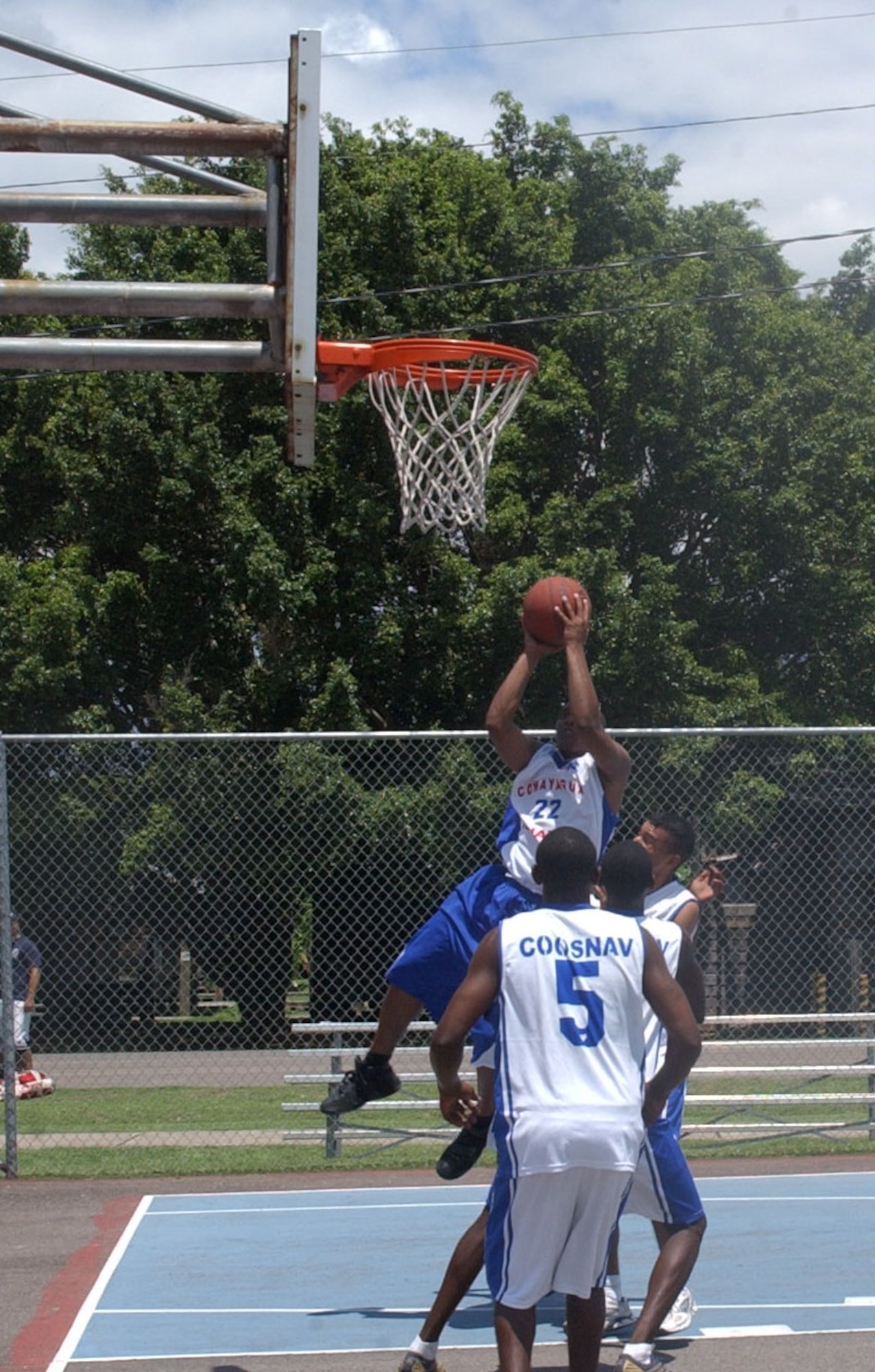 Patrick Dickents drives in for a basket during a basketball game at JTF-B Sports Day June 13. JTF-Bravo sports day pitted athletes from Soto Cano Air Base against their Honduran military counterparts in six events; soccer, swimming, basketball, softball, volleyball and a 4x400-meter relay race. U.S. Air Force photo by Senior Airman Shaun Emery.