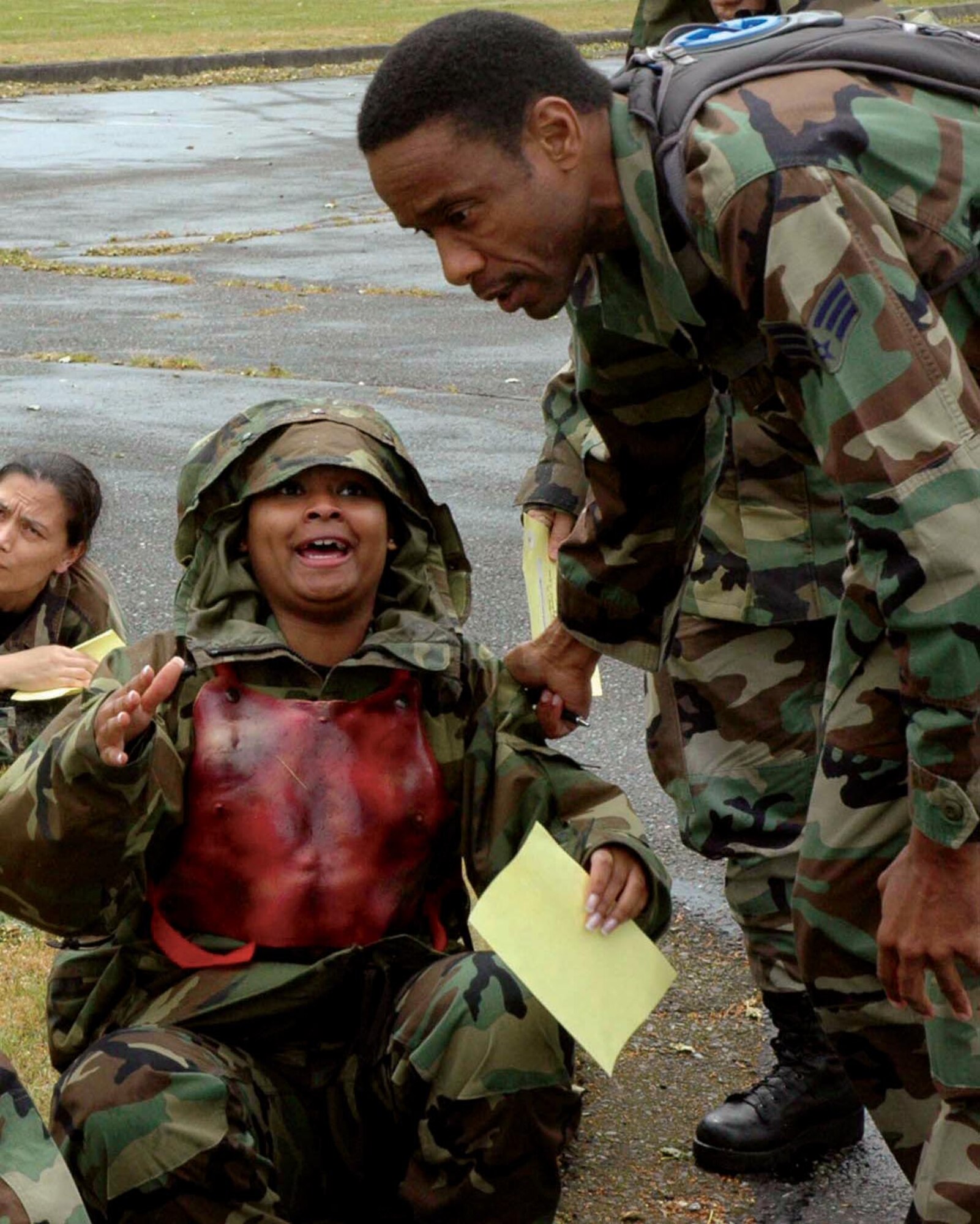 Senior Airman Anthony Carson provides medical support to fellow 446th Aeromedical Staging Squadron member, Senior Airman Ebony Daughtry, during a joint force exercise with Fort Lewis May 19.  (U.S. Air Force photo/Staff Sgt. Nick Przybyciel)