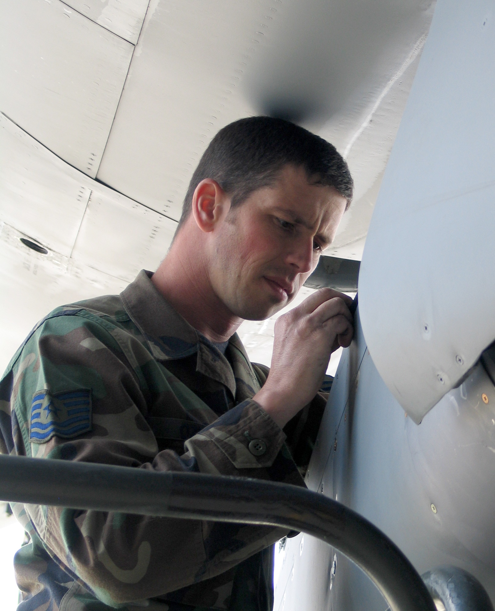 FAIRCHILD AIR FORCE BASE, Wash – Tech. Sgt. Christopher Ozella, 92nd Air Maintenance Squadron hydraulic specialist, replaces a boom seal on the KC-135 designated for Air Mobility Rodeo 2007 July 22-28 at McChord Air Force Base, Wash. Sergeant Ozella is one of 18 people chosen to represent Fairchild at the biennial competition. (U.S. Air Force photo/Staff Sgt. Connie L. Bias) 
