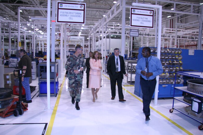 Debra Walker, the Air Force’s Deputy Assistant Secretary for Logistics at the Pentagon, Al Rich, Deputy Director 76th Maintenance Wing and Col Brian Tri, Commander Aircraft Maintenance Group, demonstrate the remarkable transformation occurring as a result of “Lean” principles in the F100 maintenance line.