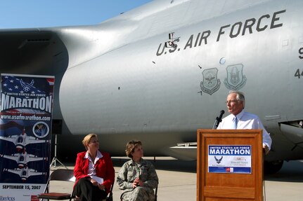 With the U.S. Air Force Marathon just three months away, Air Force and Wright State University officials conducted a press conference June 13 on the flightline of Wright-Patterson Air Force Base, Ohio. Dr. David Hopkins, president of Wright State University, highlighted details of this year's race along with Molly Loudon (left), marathon director, and Lt. Gen. Terry Gabreski, vice commander of Air Force Materiel Command.  (U.S. Air Force photo/Kathleen A.K. Lopez)