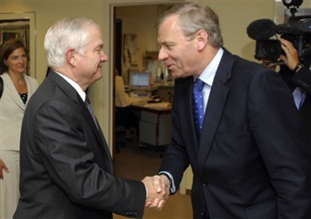 Secretary of Defense Robert M. Gates greets NATO Secretary General Jaap de Hoop Scheffer at North Atlantic Treaty Organization headquarters in Brussels, Belgium, June 14, 2007.
