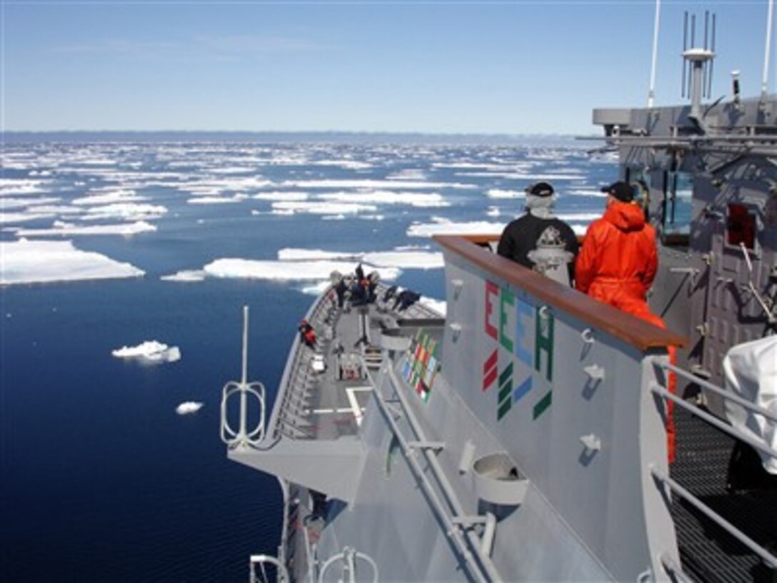 Seaman Recruits Jamal Powell (left) and Stephen Harmon stand the forward lookout watch aboard the guided-missile cruiser USS Normandy (CG 60) as the ship navigates through an ice field in the Arctic Circle north of Iceland on June 12, 2007.  
