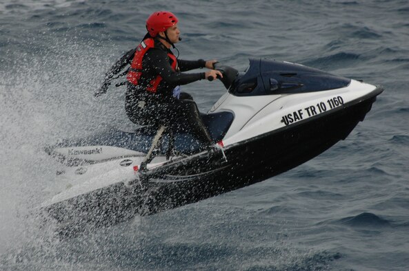 Mode VIII – An Air Force Reserve Pararescuemen races through choppy ocean waves to rescue an astronaut from the Atlantic during a joint exercise off the coast of Cape Canaveral, Fla. May 31.  The Mode VIII exercise simulates an ocean bailout for astronauts during a Space Shuttle launch.  The 920th Rescue Wing provides primary rescue support for astronauts during all launches.  Due to exercises like these, NASA and the Reserve Wing are geared up and prepared for future shuttle launches/landings.  The Human Space Flight Support Office (HSFS) at nearby Patrick Air Force Base is the primary link between the two agencies and coordinates all DoD involvement. (U.S. Air Force Photo/SSgt. Paul Flipse)