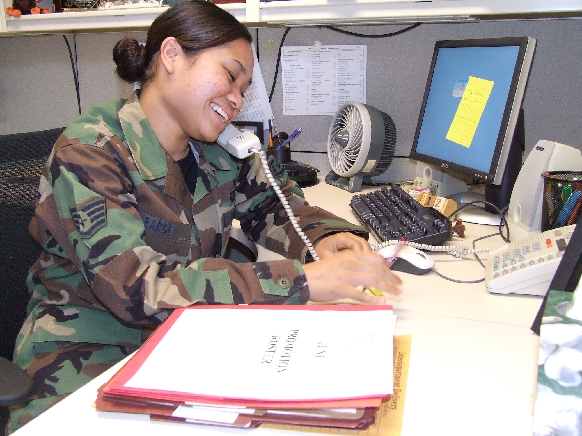 MCCHORD AIR FORCE BASE, Wash. -- Staff Sgt. Grace Barce, 62nd Mission Support Squadron, offers advice and encouragement to a newly-promoted Airman. The career enhancement office works to help Airmen with any personnel issues.
(U.S. Air Force Photo by Tyler Hemstreet)
