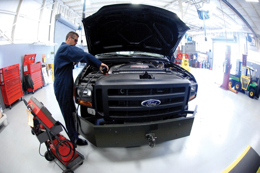 Airman Alan Yount, 62nd Logistics Readiness Squadron, load tests the charging system on a bobtail during a quality control inspection at the customer service shop on Wednesday May 23, 2007. (U.S. Air Force photo/Abner Guzman)(Released)