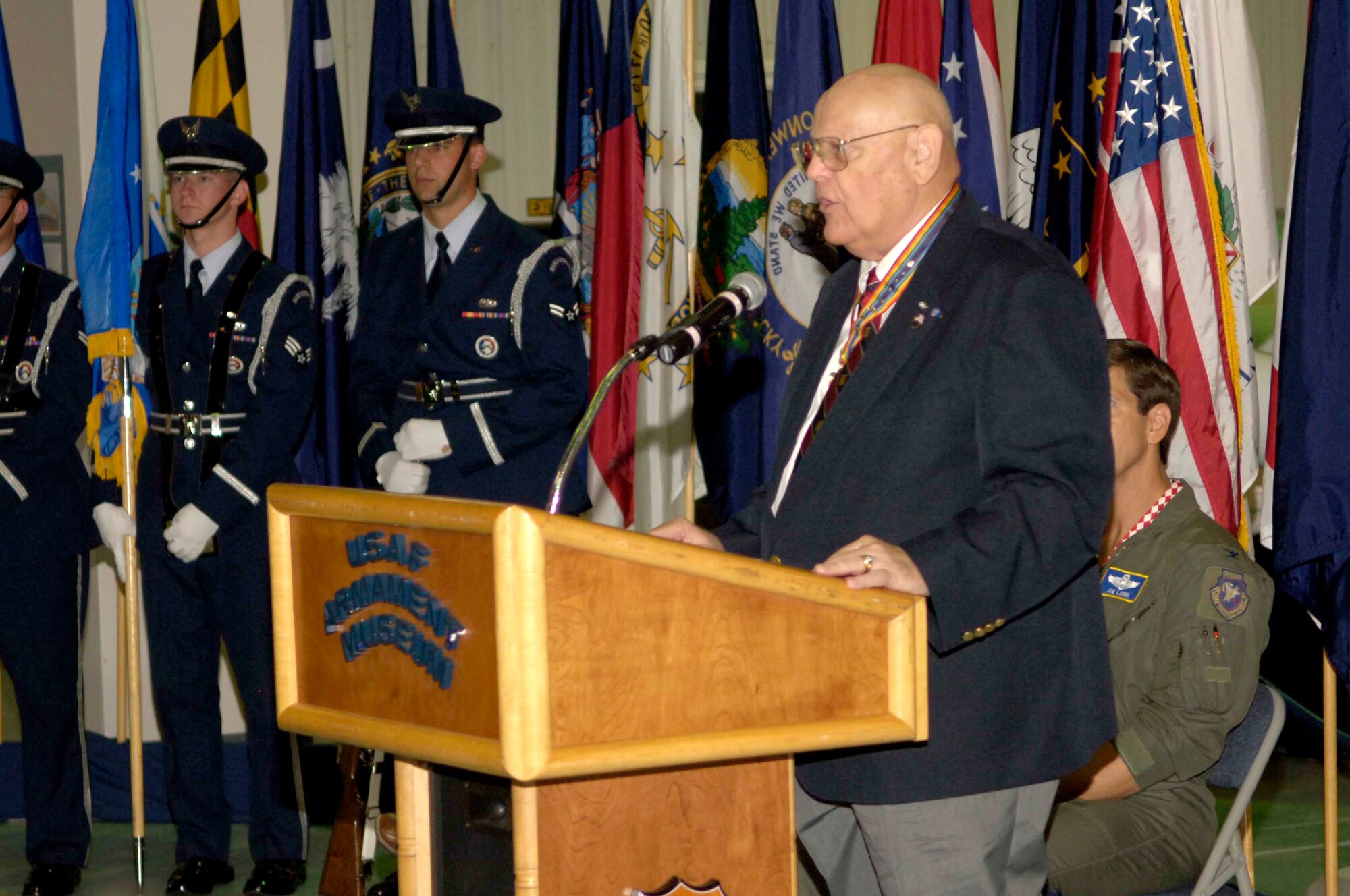 EGLIN AIR FORCE BASE. Fla. -- Retired Lt. Col. Pete Straub, former president of the Ft. Walton Beach chapter of the Military Order of the World Wars, speaks at the June 10, 2006 Massing of the Colors ceremony at the Air Force Armament Museum. Colonel Straub, who passed away during the Fall of 2006, organized the first gathering in 1995. Each gathering was held on a day before or after Flag Day for 11 consecutive years. (U.S. Air Force courtesy photo)