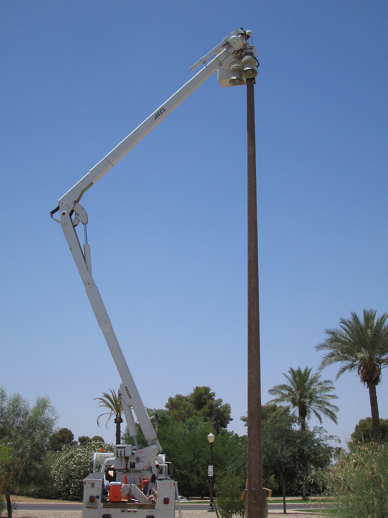 A giant voice system is being mounted on speaker towers installed throughout the base. The speakers, which range from 400 to 1600 watts, could be operational as soon as June 30.  Photo by Staff Sgt. Robert Zoellner