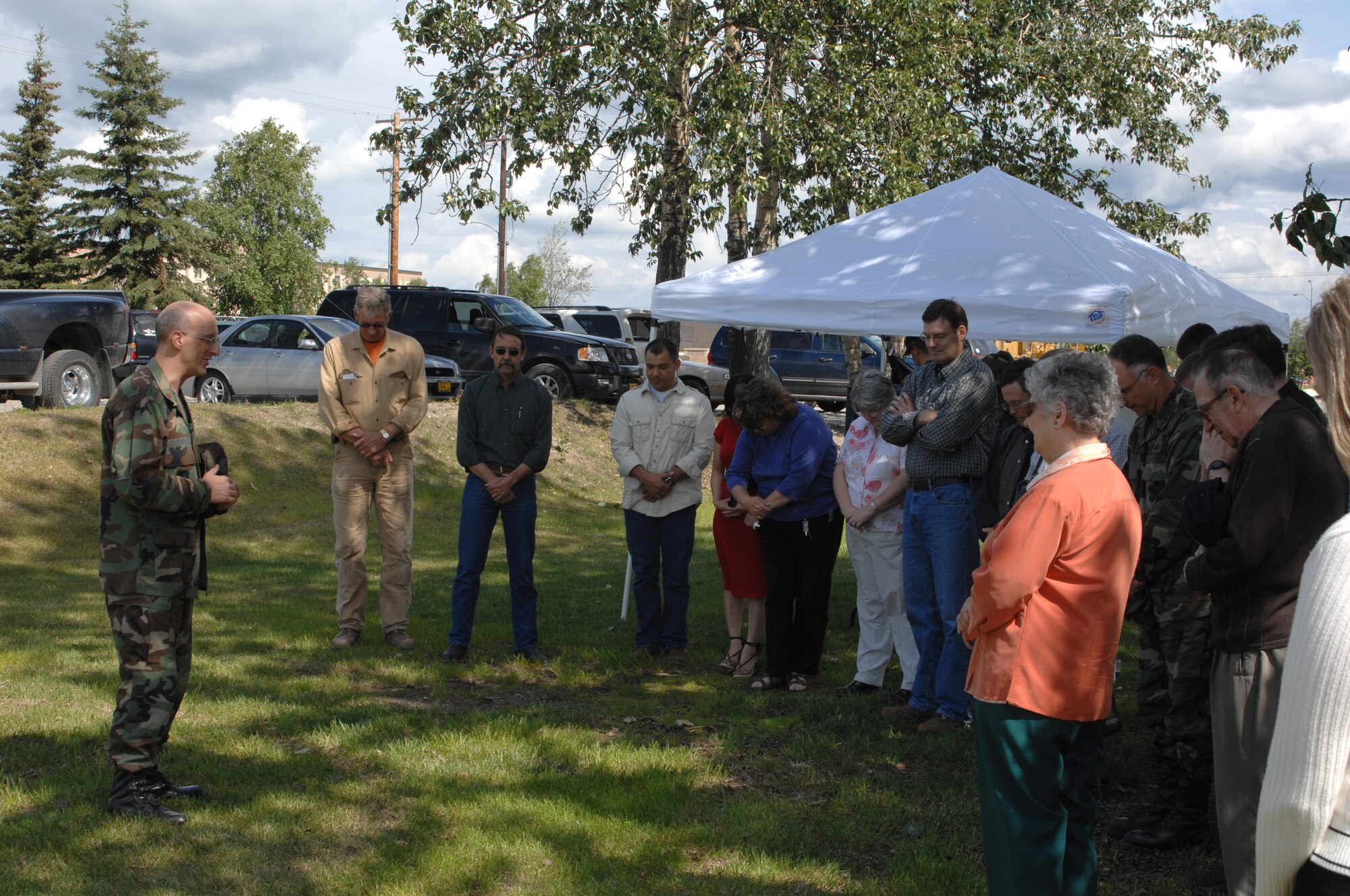 EIELSON AIR FORCE BASE, Alaska --  Chaplain (Maj.)David Terrinoni, 354th Fighter Wing wing chaplain, says a prayer during the ground-breaking ceremony for the new Eielson chapel June 14. The new facility is scheduled to be complete by July 30, 2008. (U.S. Air Force photo by Staff Sgt. Tia Schroeder) 
