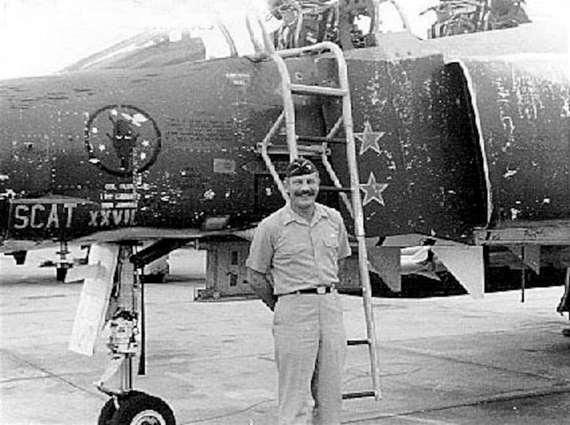 Col. Robin Olds with his F-4C Phantom, Scat XXVII.  He was the commander of the 8th Tactical Fighter Wing at Ubon Air Base, Thailand, and was credited with shooting down four enemy MiG aircraft in aerial combat over North Vietnam.  (U.S. Air Force photo)




(U.S. Air Force photo)