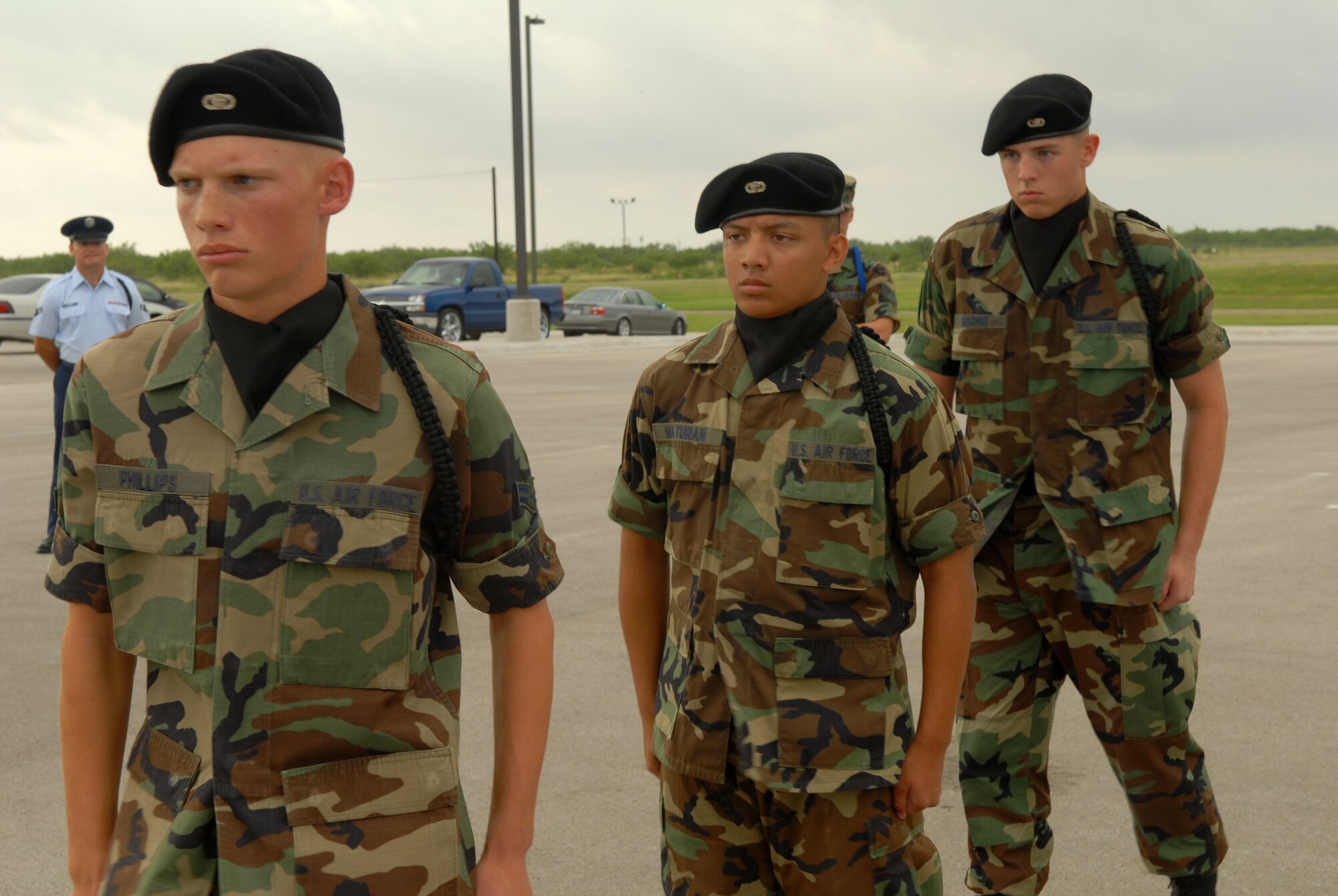 From left to right, Airman Samuel Phillips, Airman Basic Christopher Maturan and Airman Basic Allan Boring, from the 315th Training Squadron, stand in the final round of the individual drill competition at the 17th Training Group drill competition June 9. Airman Phillips took home the trophy as the last Airman standing. (U.S. Air Force photo by Tech. Sgt. Randy Mallard).