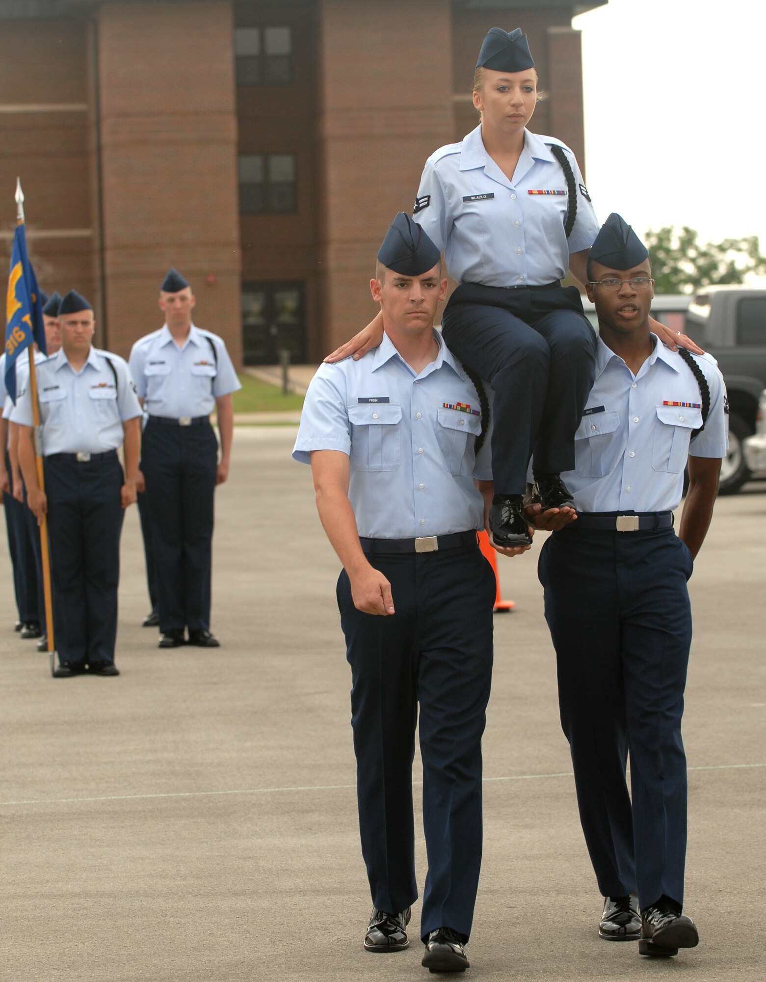 Members of the 316th Training Squadron approach the judges during the exhibition drill portion of the 17th Training Group drill competition June 9, which featured drill routines designed by the drill teams. The 316 TRS took first place in exhibition drill as well as an over-all first place score. (U.S. Air Force photo by Tech. Sgt. Randy Mallard)