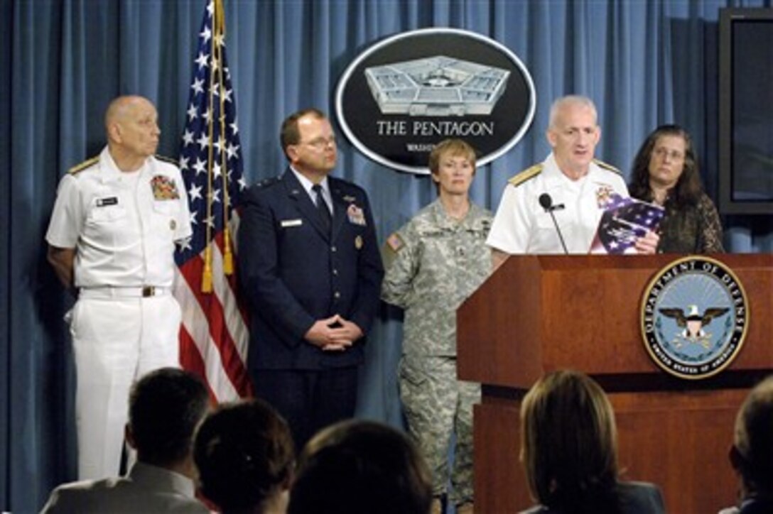 Co-chairperson of the DoD Mental Health Task Force Vice Adm. Donald Arthur, U.S. Navy, backed by members of his team, leads a Pentagon press conference on June 15, 2007, dealing with their recently released report to Congress.  Members of the DoD Mental Health Task Force on stage are, from the left: Deputy Surgeon General of the Navy Rear Adm. John Meteczun, Deputy Surgeon General of the Air Force Maj. Gen. Bruce Green, Commander of the U.S. Army Medical Command and Acting Surgeon General of the Army Maj. Gen. Gale S. Pollock, Arthur and Director of Purdue University's Military Family Research Institute Dr. Shelly MacDermid.  