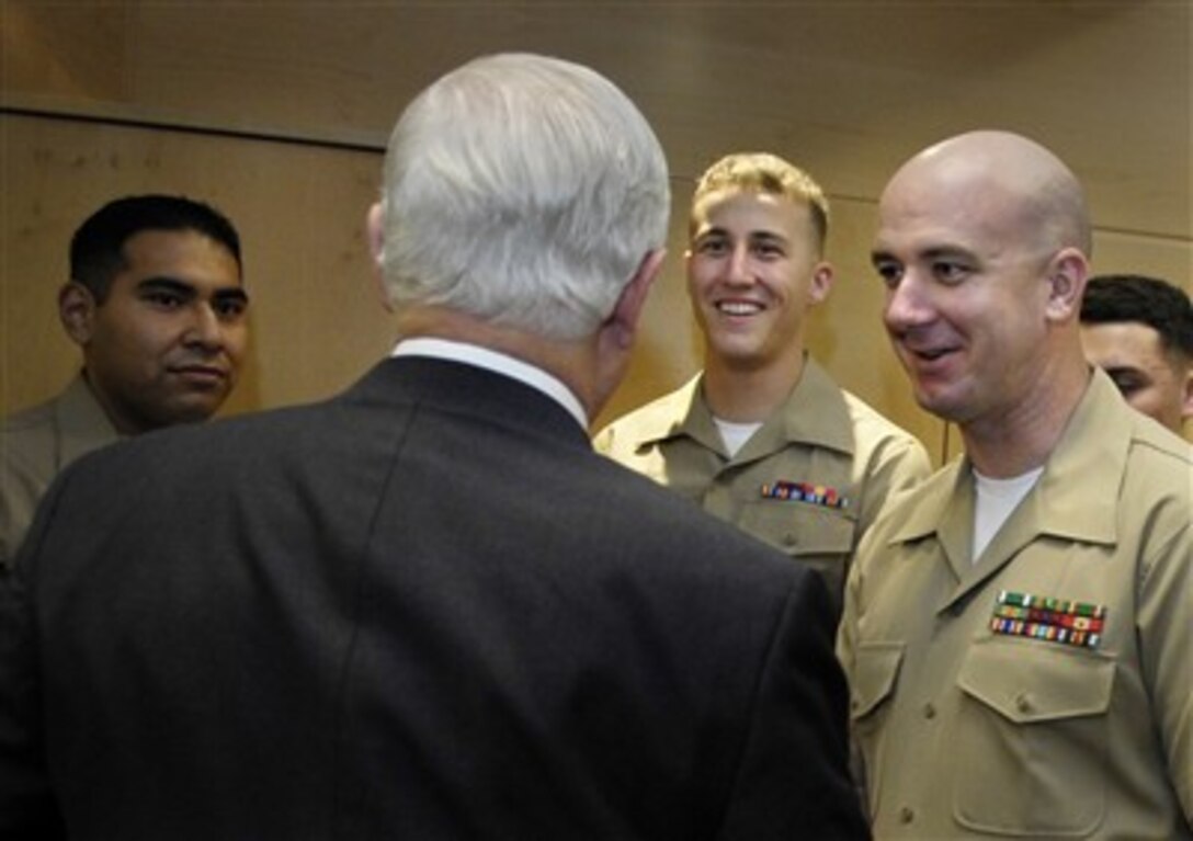 Secretary of Defense Robert M. Gates meets with Marines from the U.S. Embassy during the NATO Defense Ministerial in Brussels, Belgium, June 15, 2007.