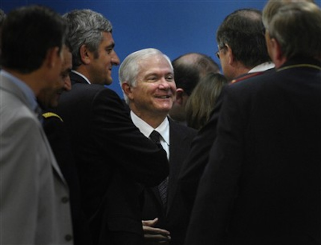 Secretary of Defense Robert M. Gates (center) meets informally with French Minister of Defense Herve Morin and German Defense Minister Franz Josef Jung during the two-day formal NATO Defense Ministerial meetings in Brussels, Belgium, on June 14, 2007.  