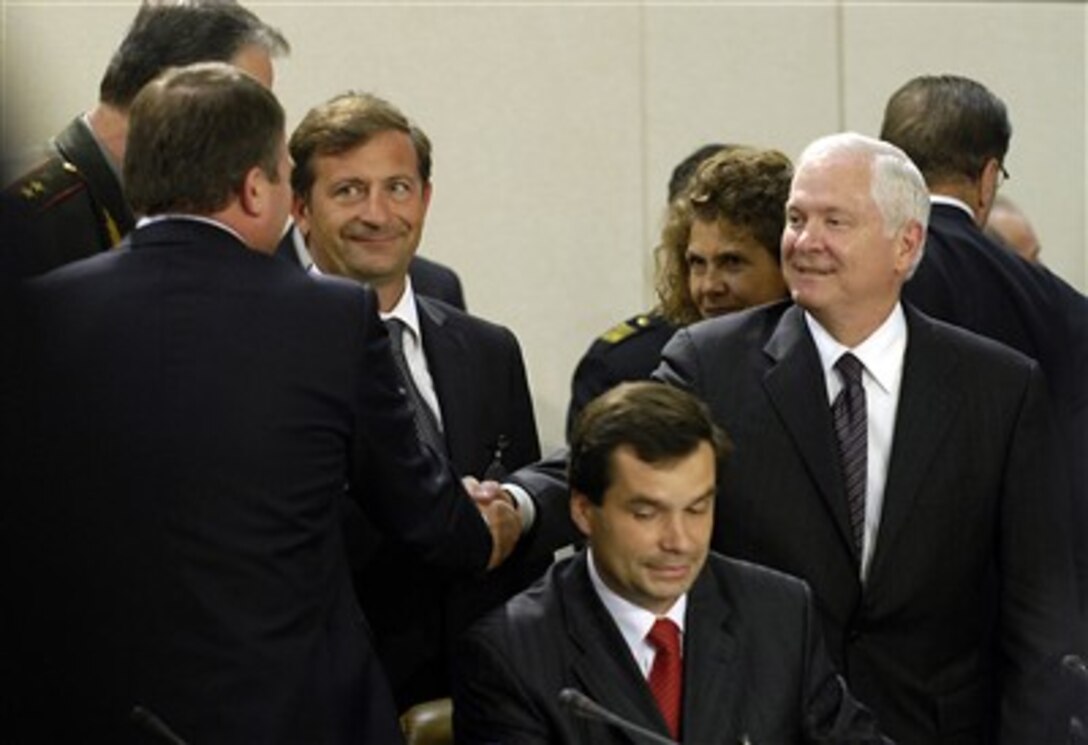 Secretary of Defense Robert M. Gates (right) shakes hands with Russian Defense Minister Anatoliy Eduardovich Serdyukov before the start of the NATO-Russia Council conference in Brussels, Belgium, on June 14, 2007. The Council conference is part of the two-day formal NATO Defense Ministerial meetings in Brussels.  