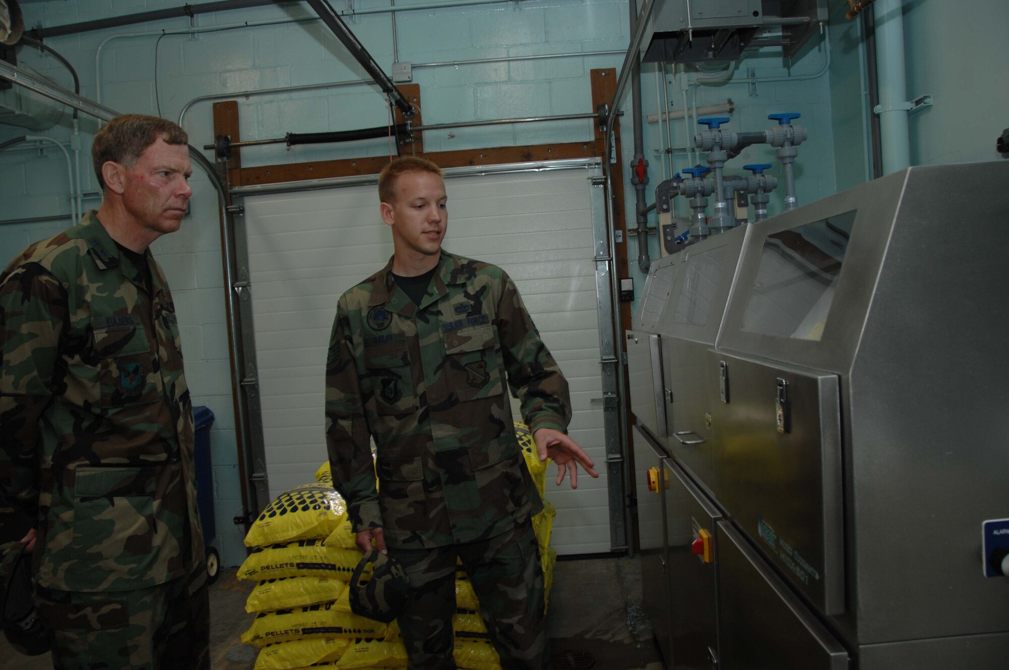 EIELSON AIR FORCE BASE, Alaska -- Maj. Gen. Del Eulberg, Air Force Civil Engineer Headquarters U.S. Air Force, is given a tour of the Water Treatment Plant by Staff Sgt. Brad Gurley, 354th Civil Engineer Squadron water plant operator, during his visit to Eielson June 18.  (U.S. Air Force photo by Staff Sgt. Tia Schroeder) 