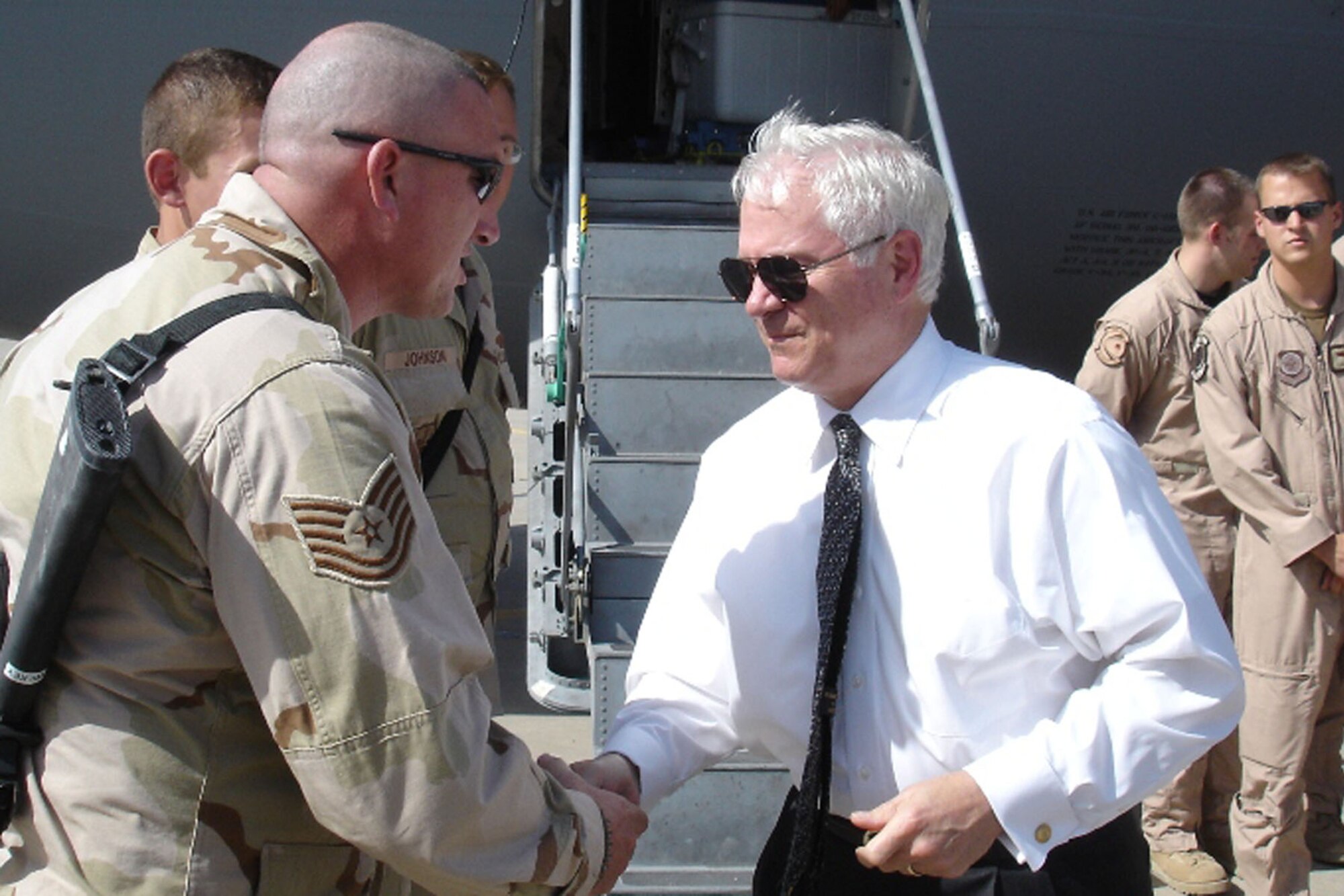 Tech Sgt. Chad Wilkey, 96th Logistics Readiness Squadron, welcomed the Secretary of Defense, Robert Gates, to his deployed location.  Secretary Gates coined the sergeant for being selected as NCO of the month for the 477th Expeditionary Readiness Squadron.  That was just one of the highlights of Sergeant Wilkey's week; he was selected for master sergeant, his daugther Brittan was selected to attend the  Colligate High School next fall at the local college, and his birthday was June 15. (courtesy photo) 

                      