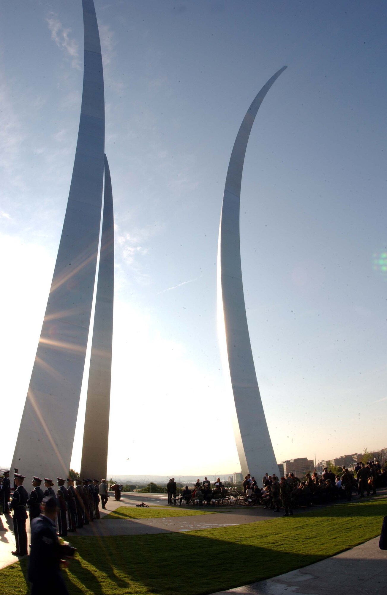ARLINGTON, Va. -- The sun rises above the Air Force Memorial during the Air Force Combat Action Medal ceremony June 12. Air Force Chief of Staff Gen. T. Michael Moseley presented six Airmen with the medal, created to recognize Air Force members who were engaged in air or ground combat "outside the wire."  The Airmen were the first in history to receive the new medal. Among the recipients was Master Sgt. Charlie Peterson, a Reservist with the 927th Logistics Readiness Squadron at Selfridge Air National Guard Base, Mich. Tom Galpin, grandson of World War I veteran Brig. Gen. William "Billy" Mitchell, also attended the ceremony. (U.S. Air Force photo/Staff Sgt. Amaani Lyle)