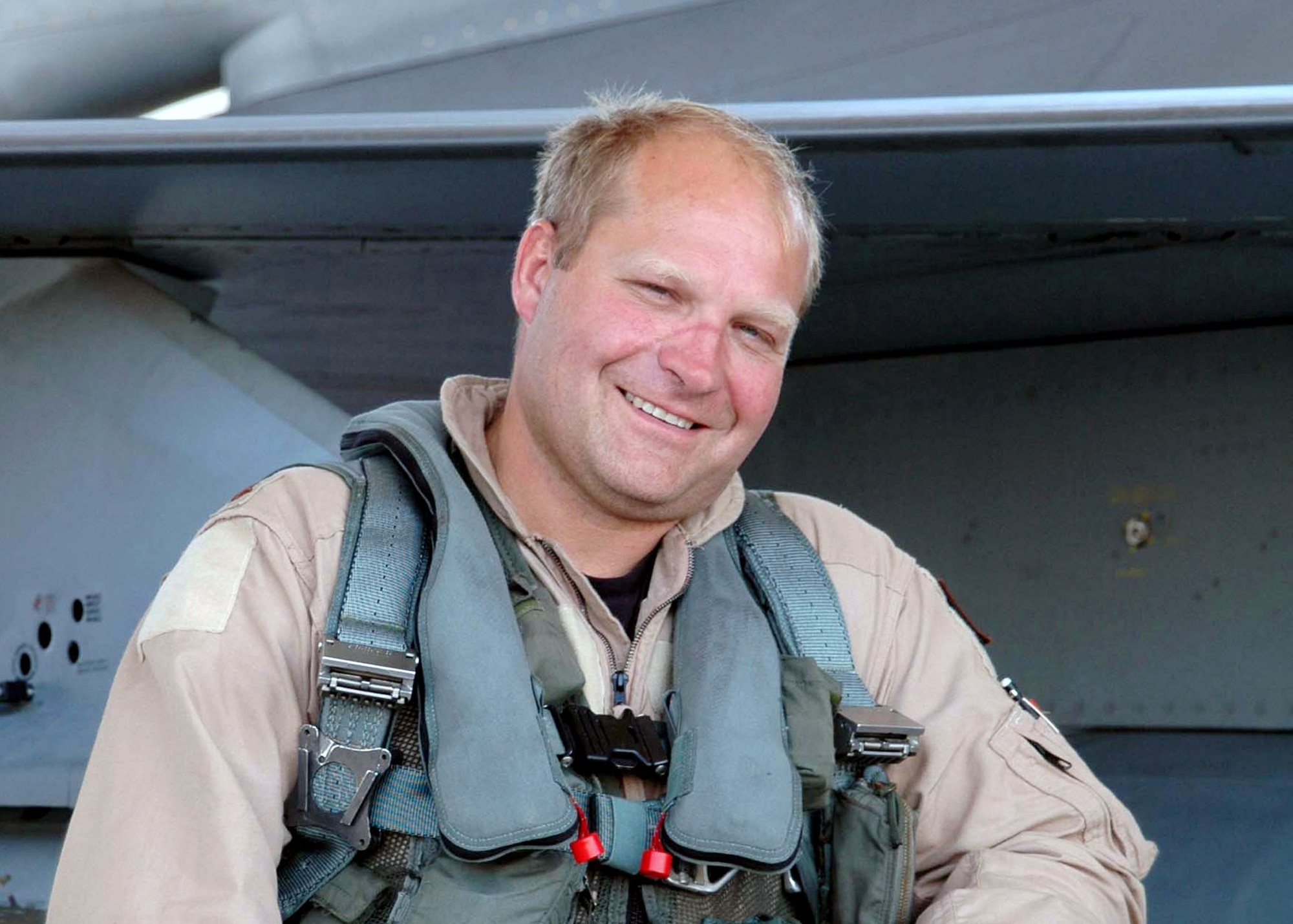 Pictured in 2005, Maj. Kevin Sonnenberg of the Ohio Air National Guard's 112th Fighter Squadron stands beside his F-16 Fighting Falcon after flying a sortie. Major Sonnenberg, 42, of McClure, Ohio, was killed in action June 15 when his F-16 crashed five miles northwest of Balad Air Base, Iraq. (U.S. Air Force photo /Tech. Sgt. Elizabeth Holliker)