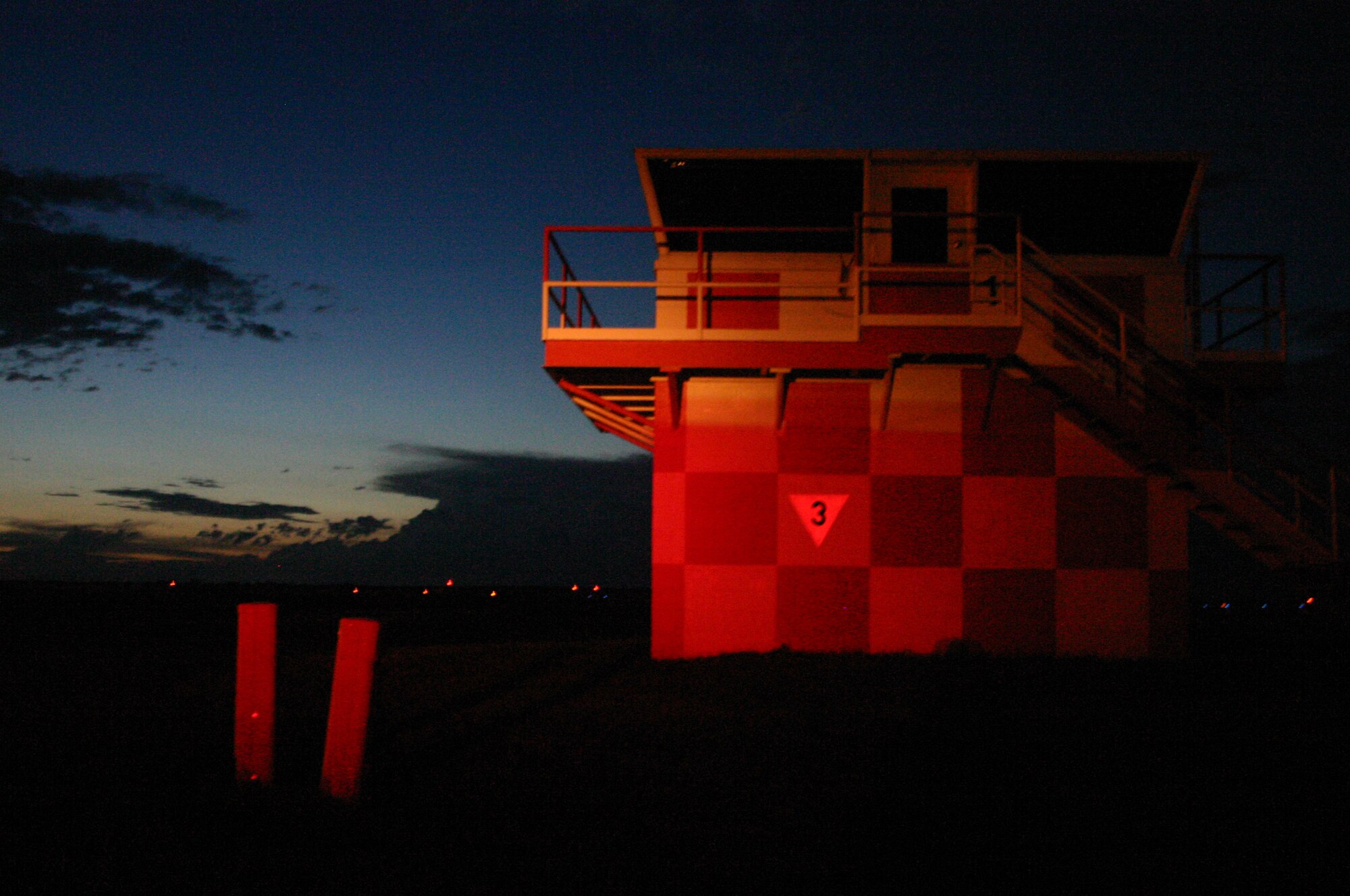 The runway supervisory unit monitors take offs and landings during night flying training. (U.S. Air Force photo/Airman 1st Class Jacob Corbin)