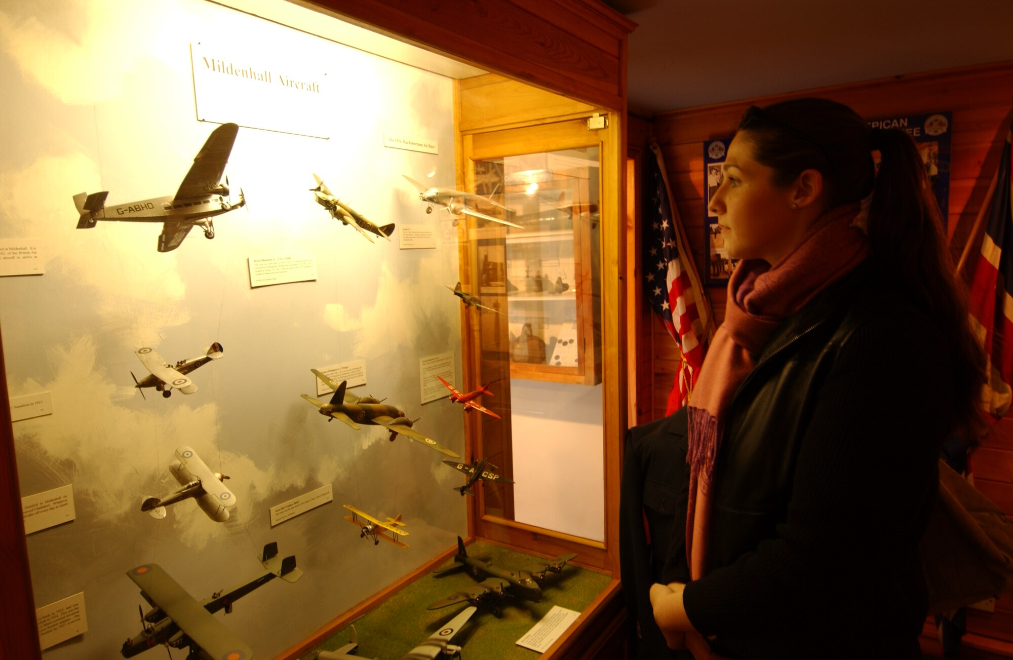 Yolanda Petosky takes a look at one of the displays in the Mildenhall Museum. 
The museum offers some interesting history on Mildenhall village and how it got started.  From a shallow swampy basin where vegetation couldn’t grow to the thriving town we now enjoy.  You can learn about local wildlife, antique appliances and household goods, and there’s even a wall dedicated to some local heroes. It’s also famous for the quantity of artifacts from an early human settlement found in the area. (Air Force photo by Tech. Sgt. Eric Petosky)