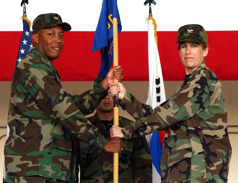 KUNSAN AIR BASE, Republic of Korea -- Colonel Rose Layman, 8th Medical Group Commander, assumes command from Colonel CQ "Wolf" Brown, 8th Fighter Wing Commander June 18.  (U.S. Air Force photo/Senior Airman Steven R. Doty)