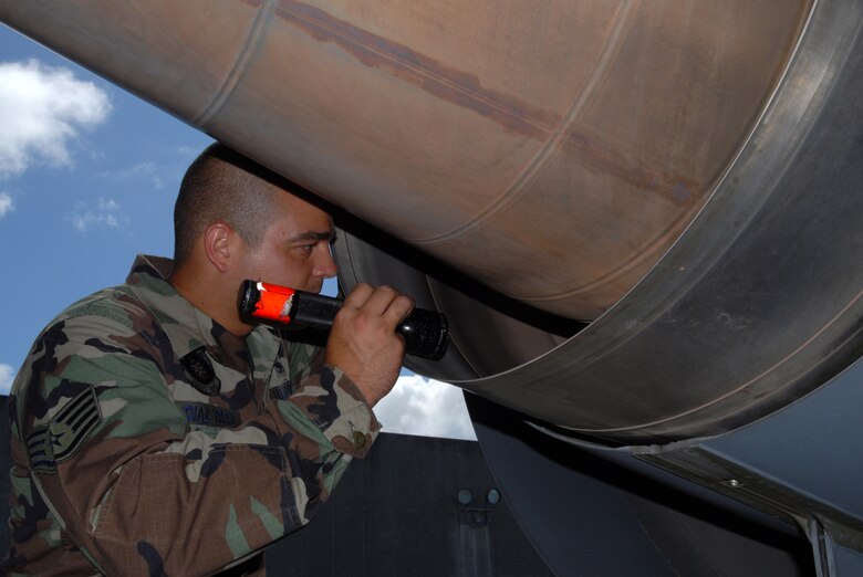 Staff Sgt. Roberto Diaz-Velez, 718th Air Maintenance Squadron, at Kadena Air Base, Japan, inspects one of the tourbine blades on a KC-135 aircraft in preparation for the Air Mobility Rodeo July 22-28 at McChord Air Force Base, Wash. Several 18th Wing units have begun practicing for the annual competition that pits teams from around the world. 
(U.S. Air Force/Airman 1st Class Kasey Zickmund)