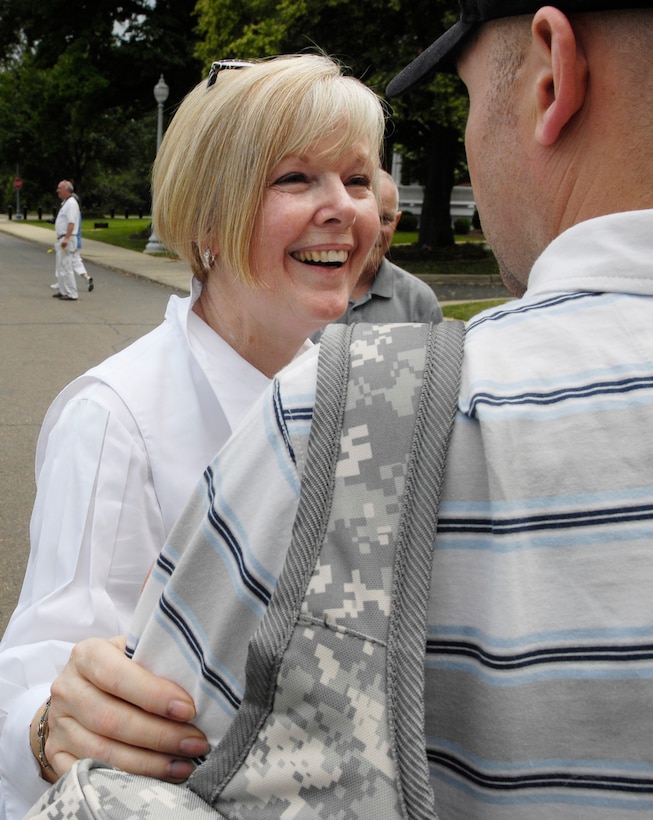 Lynne Pace, wife of U.S. Marine Gen. Peter Pace, meets with wounded servicemembers and their families from Walter Reed and Bethesda Medical Centers during a picnic in their honor at the Paces' home on Fort Myer, Va., June 16, 2007. 