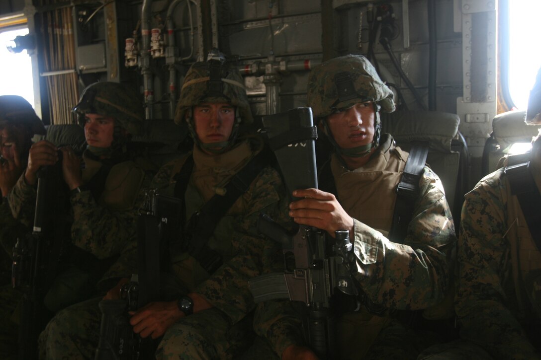 FIRE BASE GLORIA, MARINE CORPS BASE CAMP PENDLETON, Calif. ? Marines with Weapons Company, Battalion Landing Team 1st Battalion, 5th Marine Regiment, 11th Marine Expeditionary Unit, from here, are enroute to evacuate a wounded pilot during in a Tactical Recovery of Aircraft and Personnel (TRAP) exercise June 14, here. The Marines with the BLT were engaged with a mock AV-8B Harrier II accident and the recovery and evacuation of the pilot. The training was provided by Special Operations Training Group, I Marine Expeditionary Force, from here.