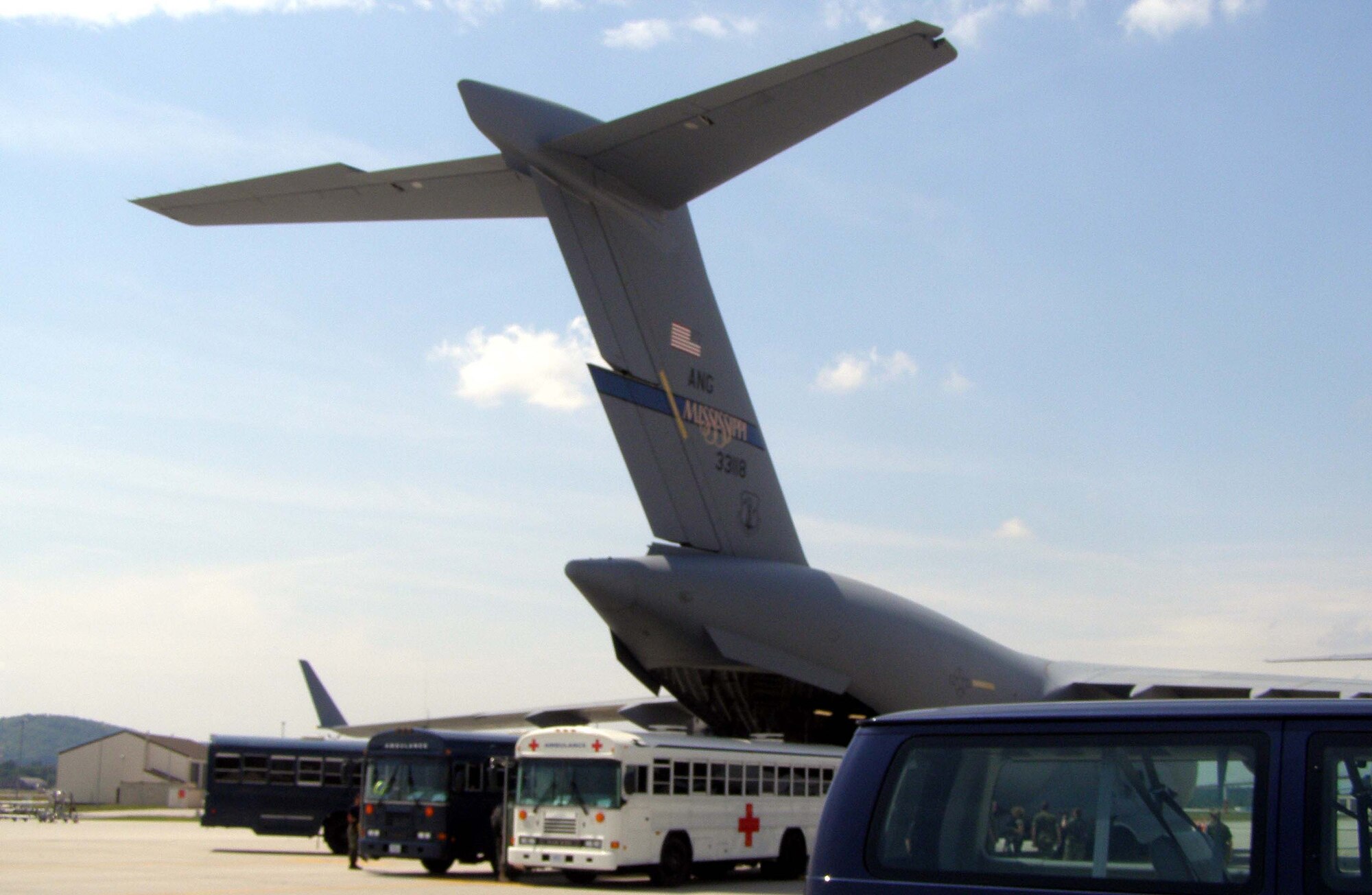 RAMSTEIN AIR BASE, Germany -- Medical buses line up to meet warrior patients returning from various areas of responsibility June 14. The patients arrived via a C-17 Globemaster III assigned to the Mississippi Air National Guard. (U.S. Air Force photo/Staff Sgt. Vanessa Thomson)