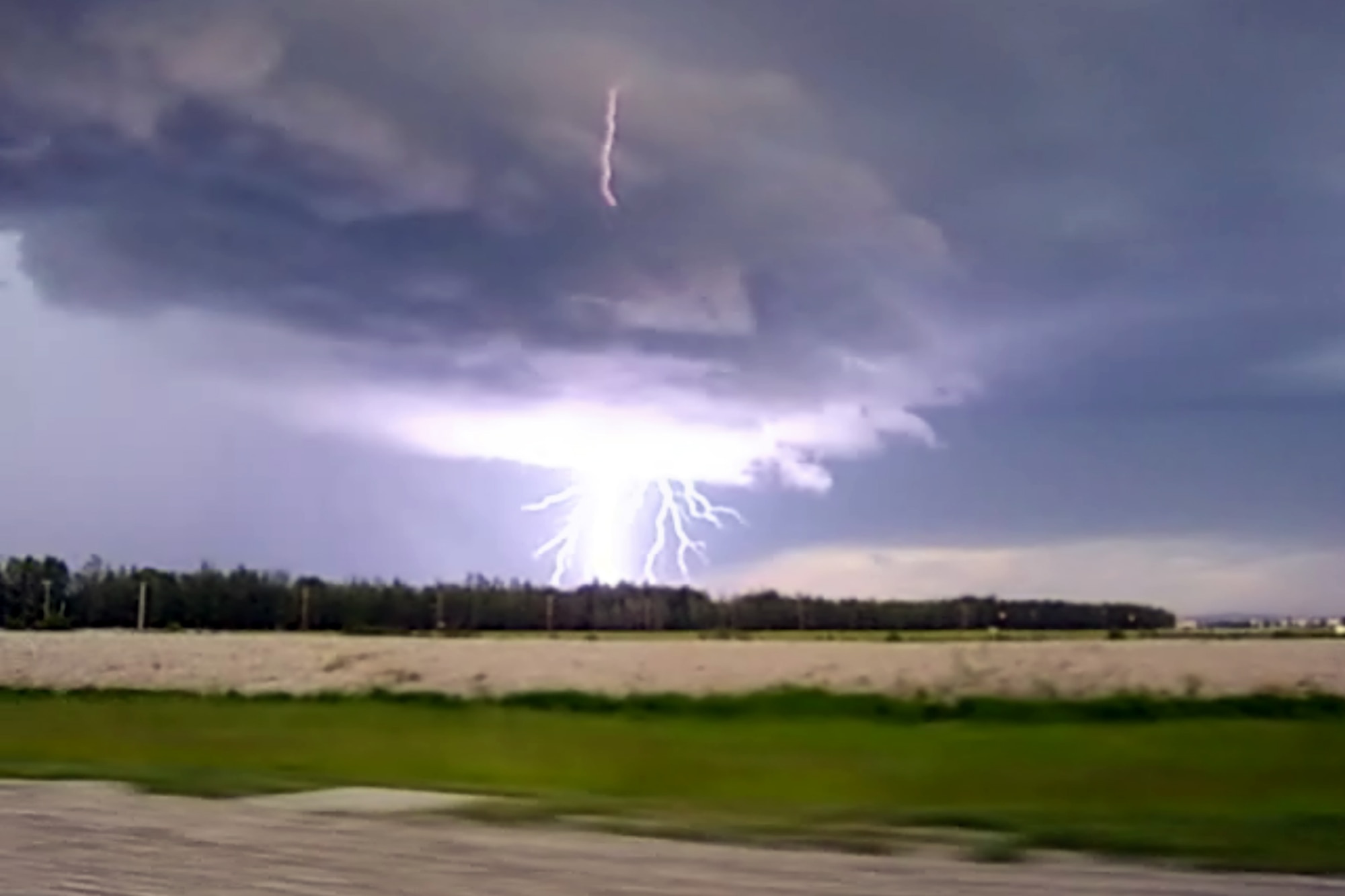 EIELSON AIR FORCE BASE, Alaska--Lightening strikes during a thunderstorm the evening of June 17 on base. Lightening storms are somewhat rare to base residents, however it is not uncommon for thunderstorms to occur in Alaska. In an average Alaska summertime, Alaska can see just as much, if not more lightening than Florida. Most thunderstorms that happen in the interior Alaska are unseen due to seclusion on a range; the ones that are seen are extremely visible as the atmosphere gets thinner closer to the North Pole (and South Pole) and storms generally sit closer to ground because of that. (U.S. Air Force photo by Airman 1st Class Jonathan Scholl)