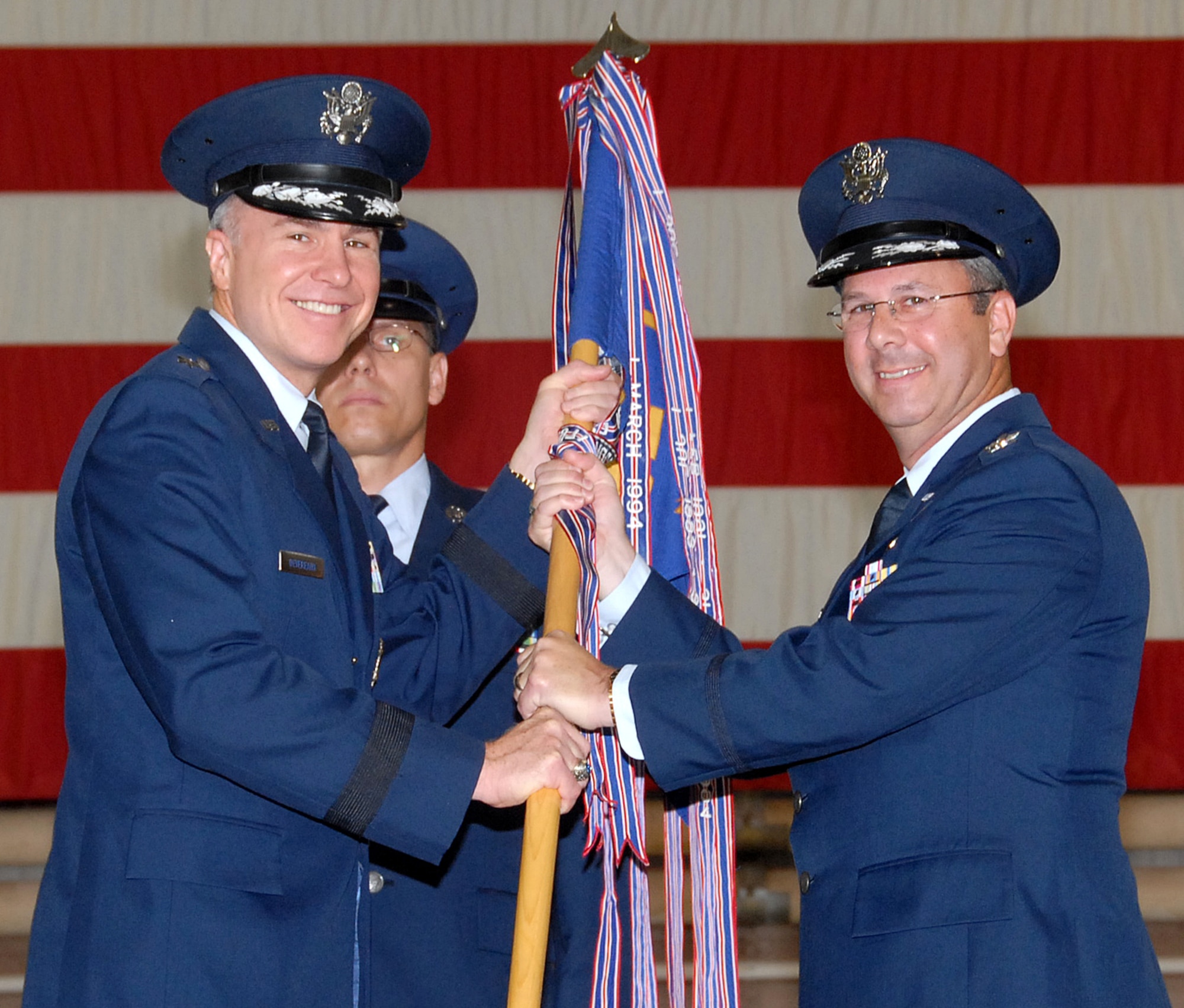 Col. David Norsworthy accepts command of the 982nd Training Group from 82nd Training Wing Commander Brig. Gen. Richard Devereaux during the change of command ceremony June 15 at Hangar 1040. (U.S. Air Force photo/Mike Litteken)