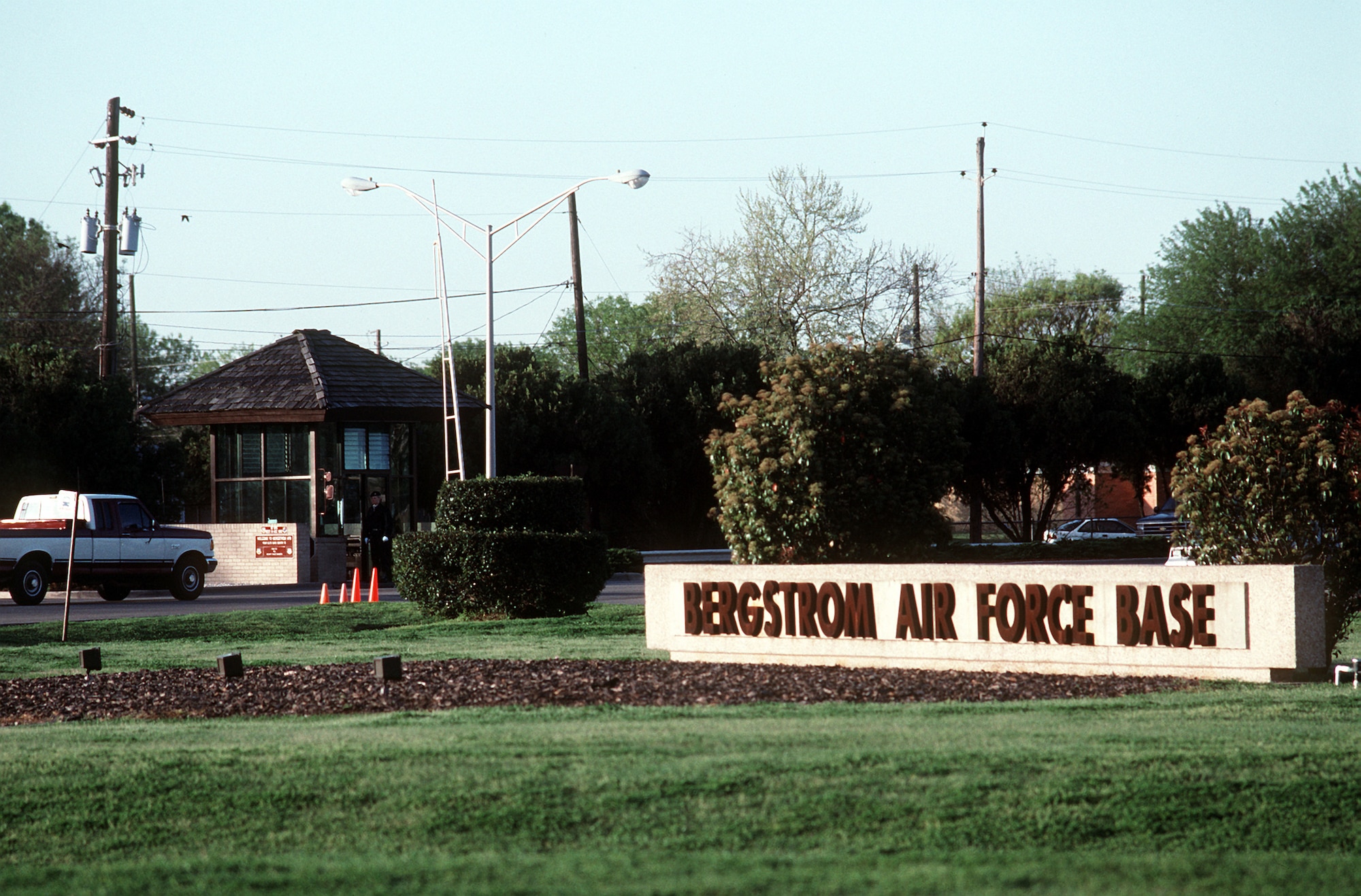 A right side view of the main gate at the former Bergrstrom Air Force Base, Texas, prior to the installation's closure in 1993.