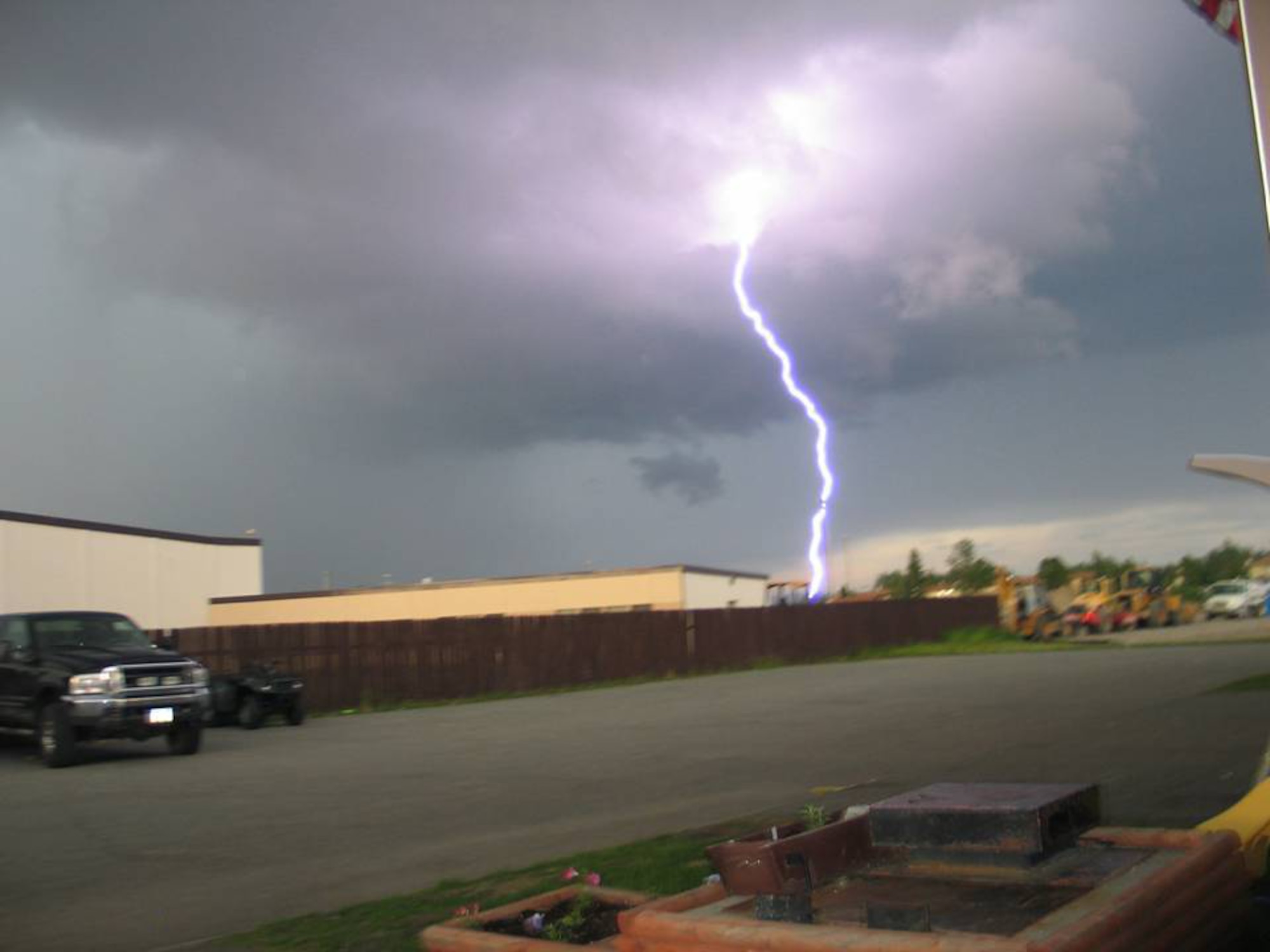 EIELSON AIR FORCE BASE, Alaska--Lighting strikes during a thunderstorm the evening of June 17 on base. Lightening storms are somewhat rare to base residents, however it is not uncommon for thunderstorms to occur in Alaska. In an average Alaska summertime, Alaska can see just as much, if not more lightening than Florida. Most thunderstorms that happen in the interior Alaska are unseen due to seclusion on a range; the ones that are seen are extremely visible as the atmosphere gets thinner closer to the North Pole (and South Pole) and storms generally sit closer to ground because of that. (U.S. Air Force photo by Staff Sgt. Kevin Carter)