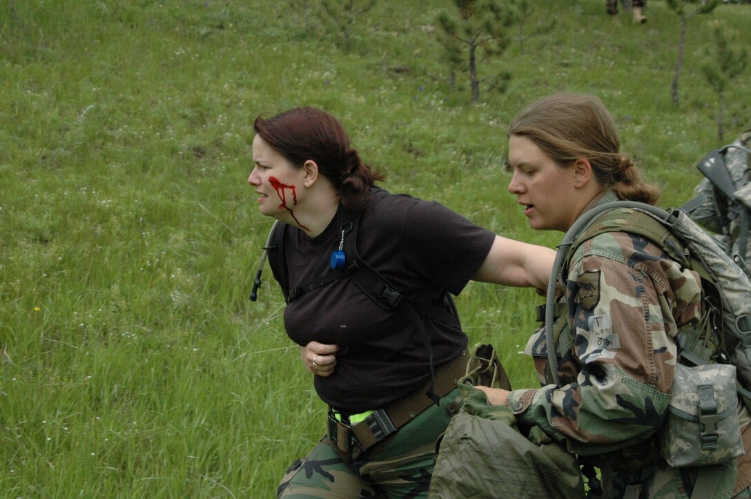 Airmen participate in Joint Thunder 2007 for the first time in the exercise's existence. Joint Thunder is a realistic field training exercise which includes Army, Navy and Air Force units from 34 states, Canada, Singapore and Germany. Joint Thunder exercises provide better trained medics who are fully prepared to support the Global War on Terror, also it builds a better joint medical team. Medics gain knowledge on convoy operations, receive training in land navigation and participate in the Leadership Reaction Course. 
(U.S Air Force photo/Airman 1st Class Kimberly Moore Limrick)