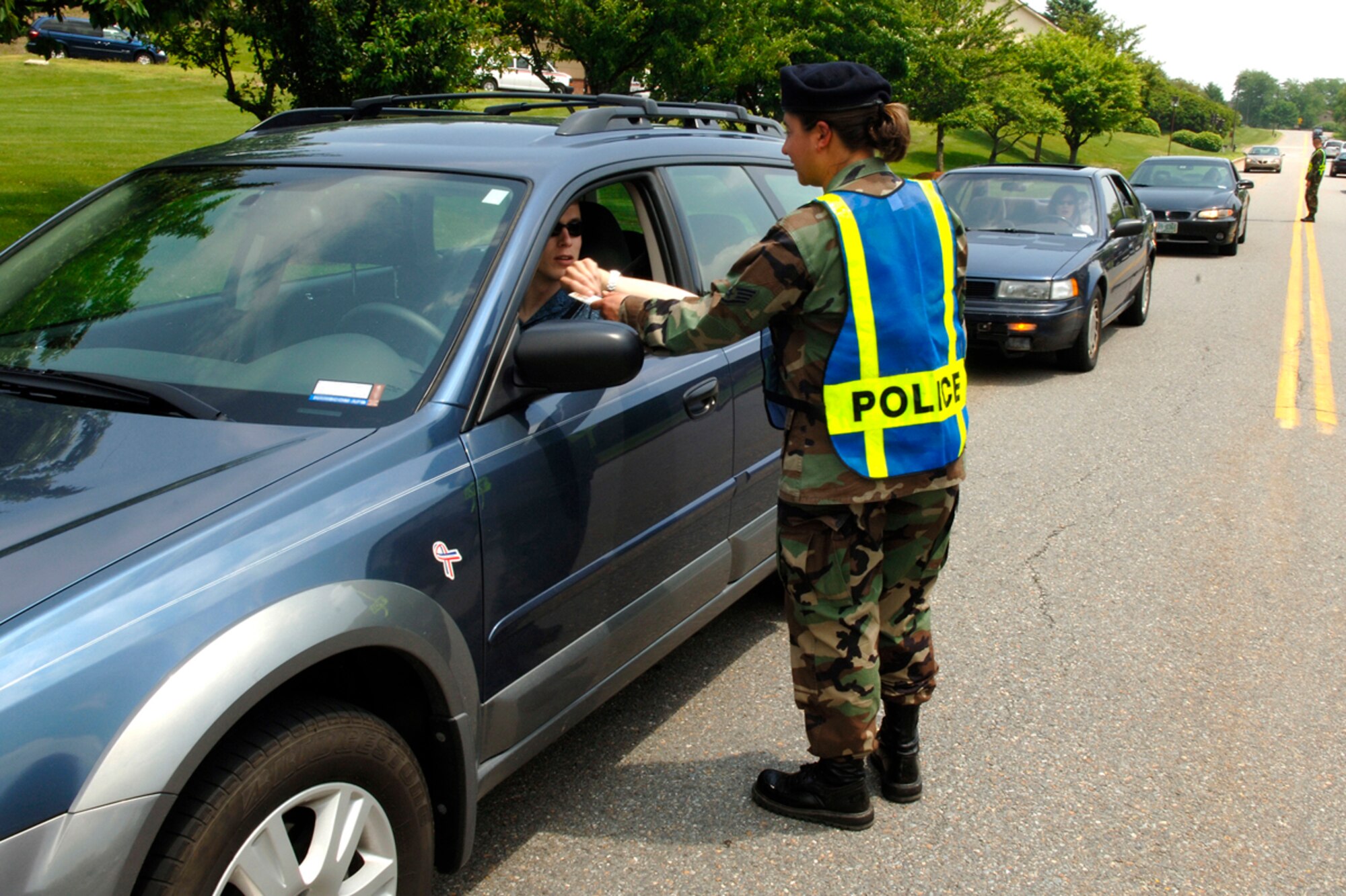 Staff Sgt. Jeanette Reichel, 66th Security Forces Squadron, checks seatbelt usage during this year’s “Click It or Ticket” campaign on base June 5. The program is designed to allow law enforcement an opportunity to ensure drivers are using their seatbelts and are securing their child passengers in approved child safety seats.

In addition to June being National Safety Month, the Air Force-wide 101 Critical Days of Summer campaign has begun and will continue to run through Labor Day weekend. (US Air Force Photo by Jan Abate)