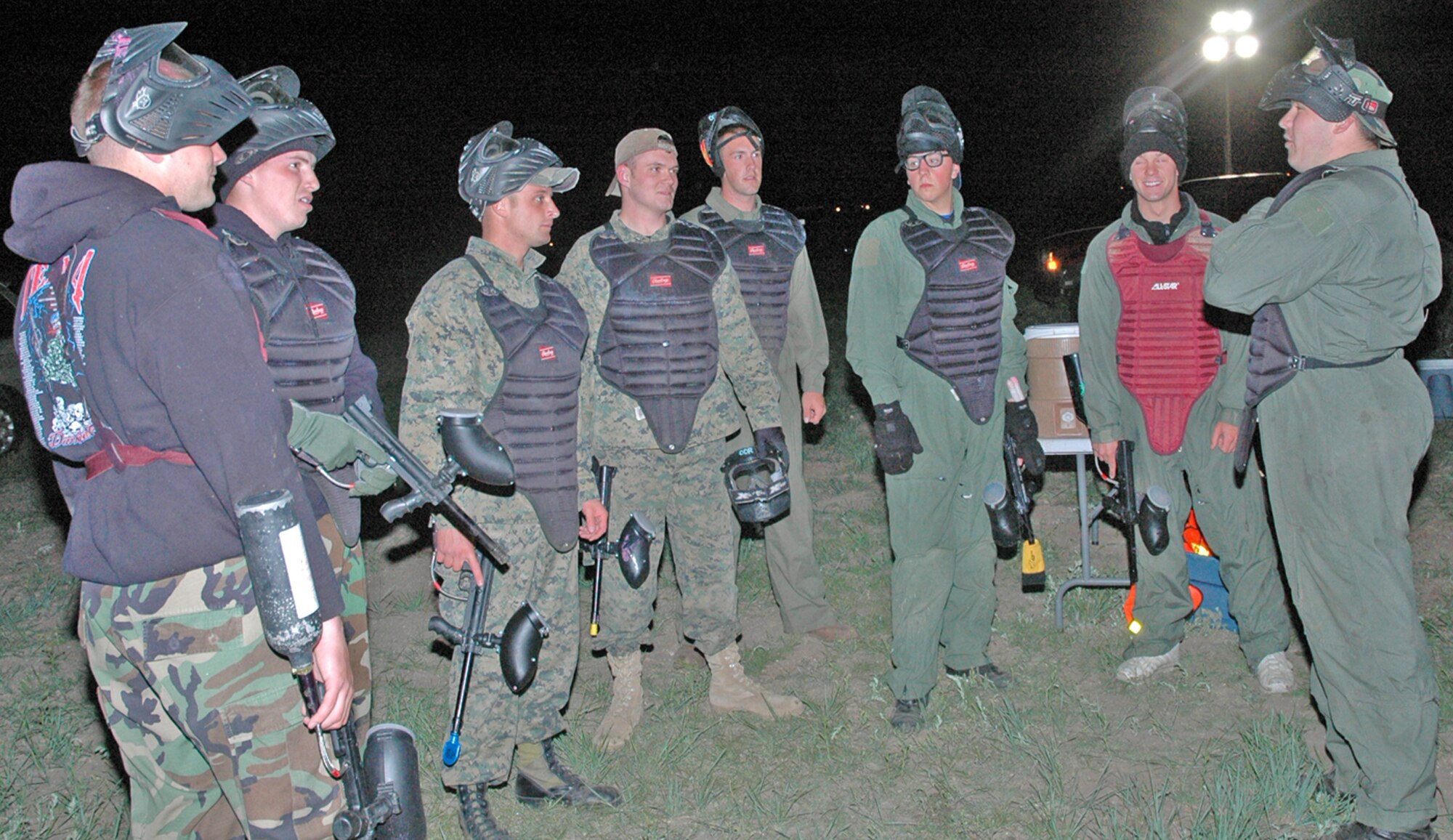 Participants in the Warren Xtreme Team Challenge discuss the rules of engagement before a paintball tournament June 8. This paintball challenge is the second part of the Xtreme challenge.