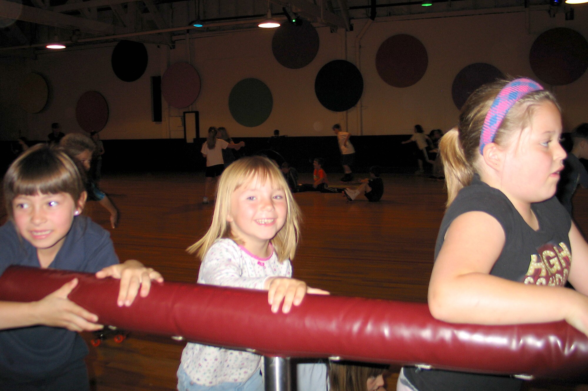 FAIRCHILD AIR FORCE BASE, Wash. – Hannah Davis, 5, smiles for the camera as she skates around the Funspot roller rink here June 14. The kindergartner and her fellow K-7 schoolmates from Trinity Catholic School in Spokane, Wash., spent the day skating and bowling during the school’s annual field trip to Fairchild. (U.S. Air Force photo/Staff Sgt. Connie L. Bias)
