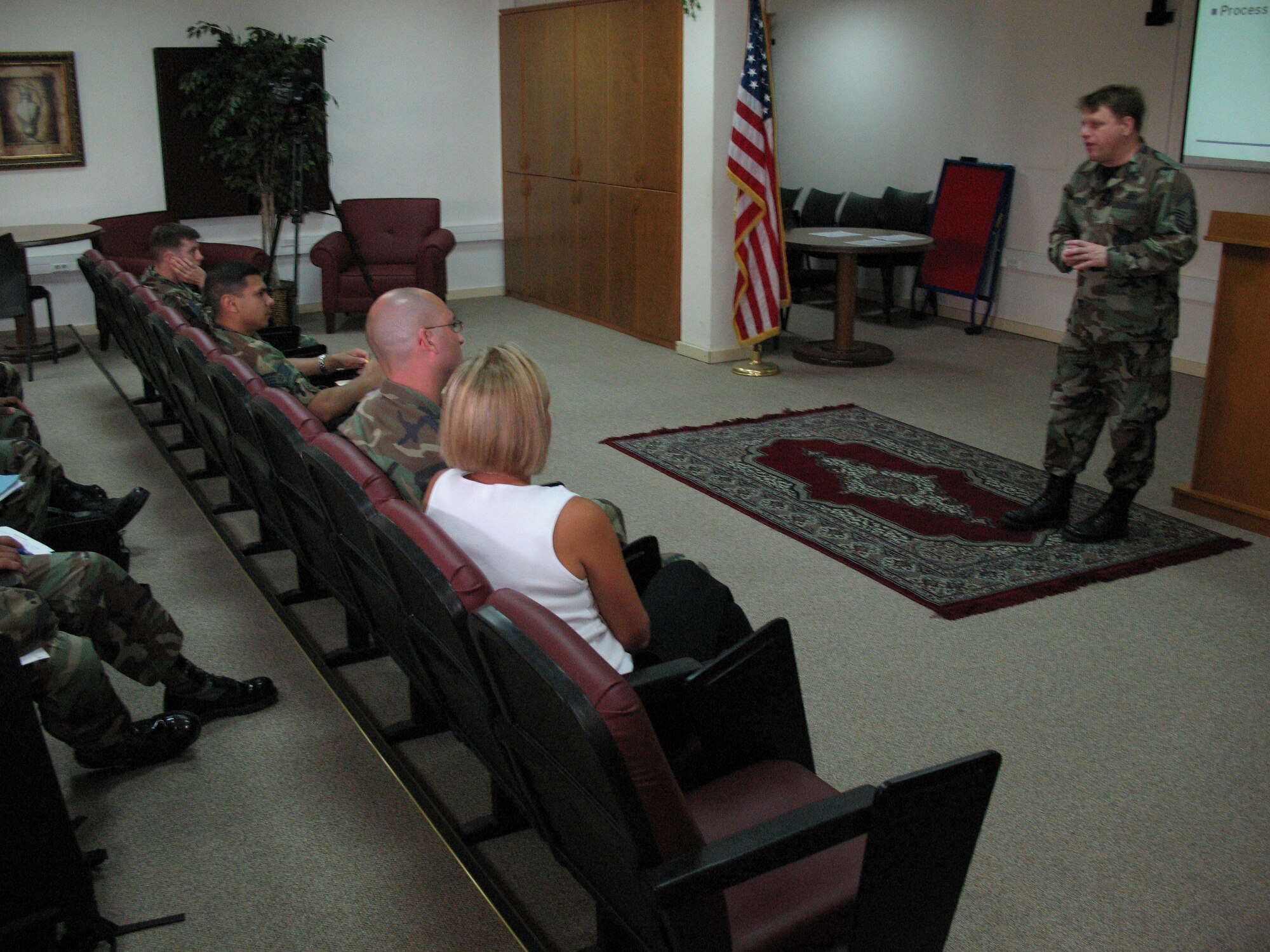 Airmen returning from deployment attend a briefing at the Reintegration Class by Senior Master Sgt. Thomas Benson, Airman and Family Readiness Center superintendent, June 7.  The class is offered by Incirlik?s Airman and Family Readiness Center and helps Airmen and their families with the post-deployment transition.(U.S. Air Force photo by Staff Sgt. Michael Jackson)(RELEASED)