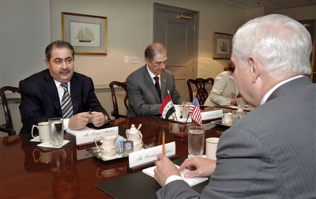 Iraq's Minister of Foreign Affairs Hoshyar Zabari (left) meets with Secretary of Defense Robert M. Gates (right) in the Pentagon on June 18, 2007.  A range of regional issues relating to Iraqi security is under discussion.  Joining Zabari at the meeting is the head of the Iraqi International Organizations & Multilateral Relations Department Srood Najib (center).  