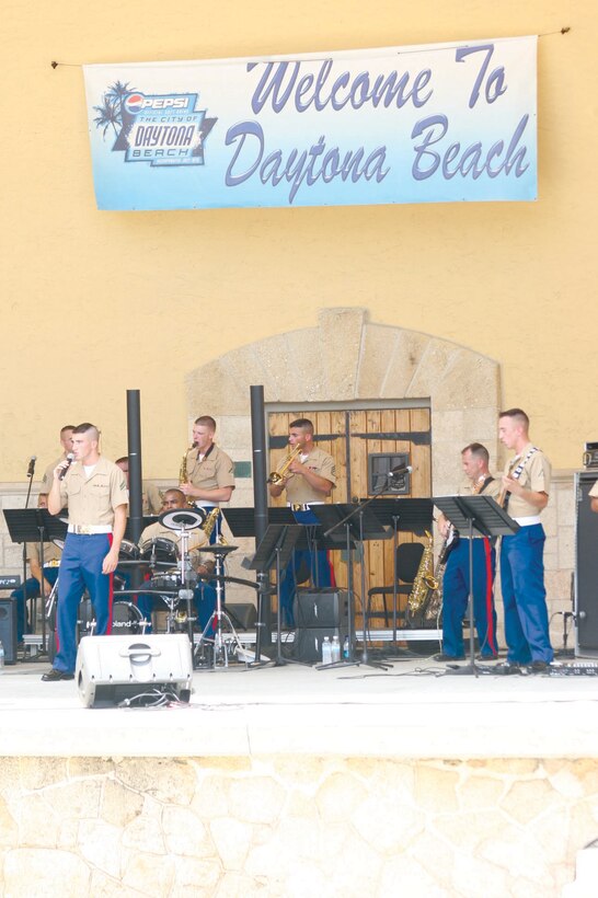 Members of the Parris Island Marine Band pump up the crowd during a performance at Daytona Beach.