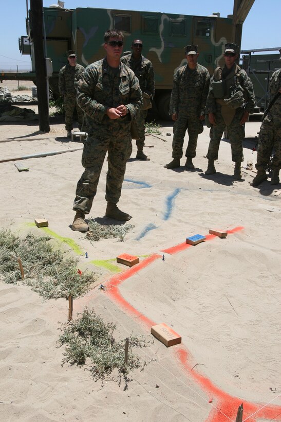FIRE BASE GLORIA, MARINE CORPS BASE CAMP PENDLETON, Calif. ? Marines with Weapons Company, Battalion Landing Team 1st Battalion, 5th Marine Regiment, 11th Marine Expeditionary Unit, from here, participate in a Tactical Recovery of Aircraft and Personnel (TRAP) exercise June 14, here. The Marines with the BLT were engaged with a mock extraction of an Army Special Operations team. The training was provided by Special Operations Training Group, I Marine Expeditionary Force, from here.