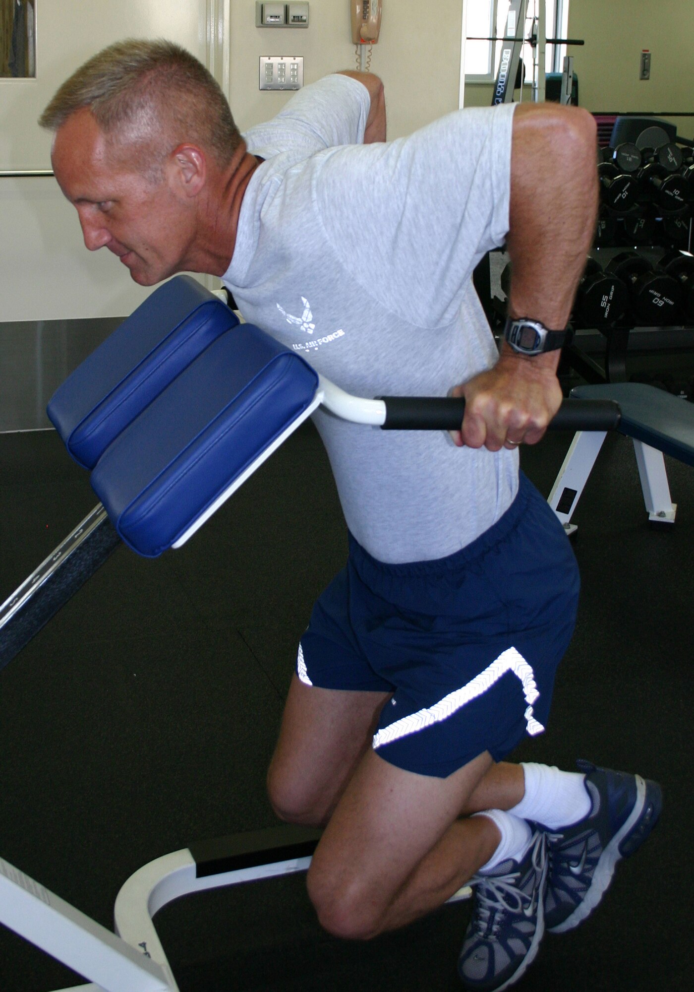 MISAWA AIR BASE, Japan -- Colonel Arnold Holcomb, 35th Mission Support Group commander, performs dips during his work out at the fitness center. The colonel has scored 100 in the age category of males in their mid-20s on his last four fitness tests. The colonel is 48. (U.S. Air Force photo by Senior Airman Sasha Navarro-Schmidt)